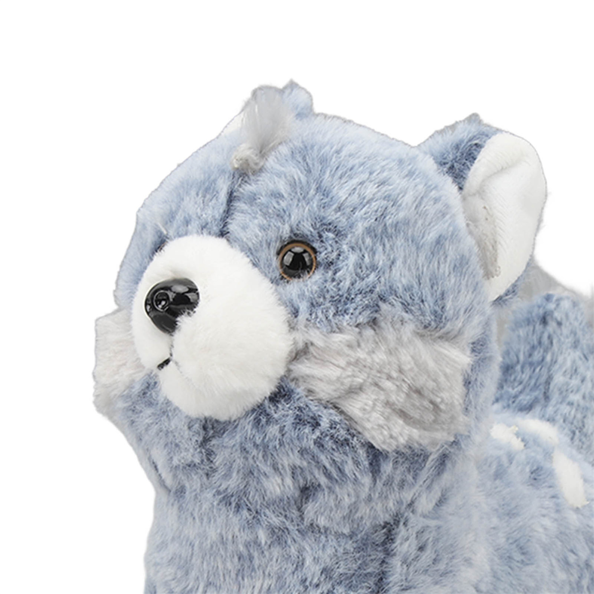 Nahaufnahme eines blauen Plüschtierbären mit weißer Schnauze und grauen Fellakzenten.