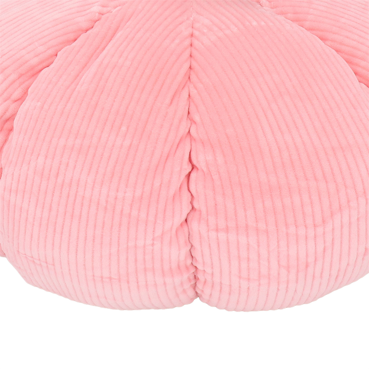 Nahaufnahme eines rosa, gerippten Stoffes, möglicherweise ein Kissen, mit einer Mittelnaht.