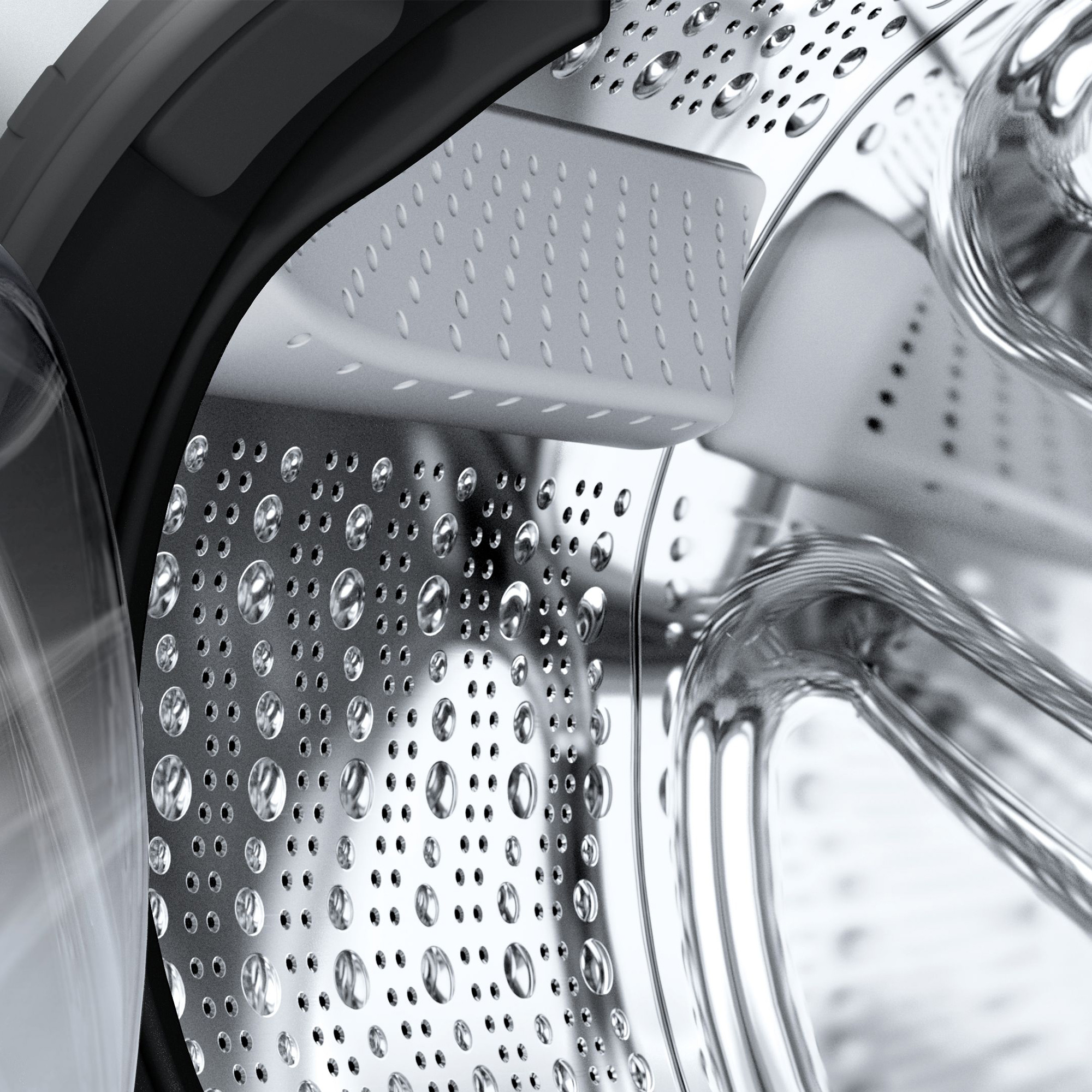Zbliżenie wnętrza bębna pralki z kroplami wody. Białe tło.