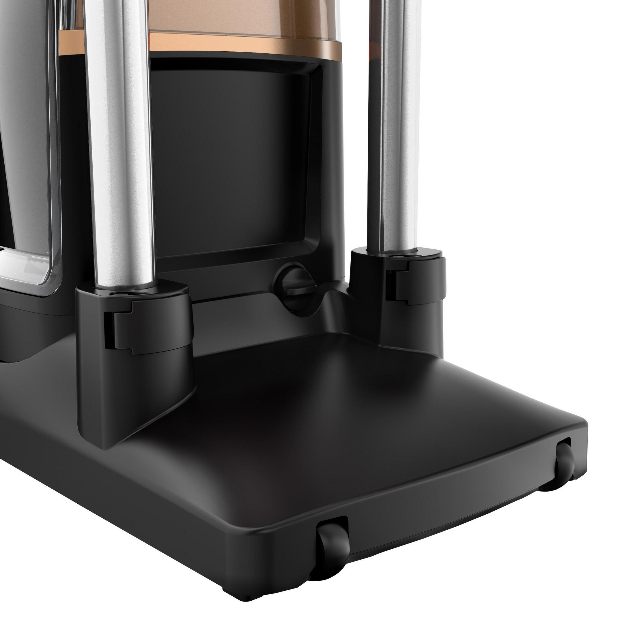 Czarna i srebrna podstawa odkurzacza z kółkami, zbliżenie, białe tło.