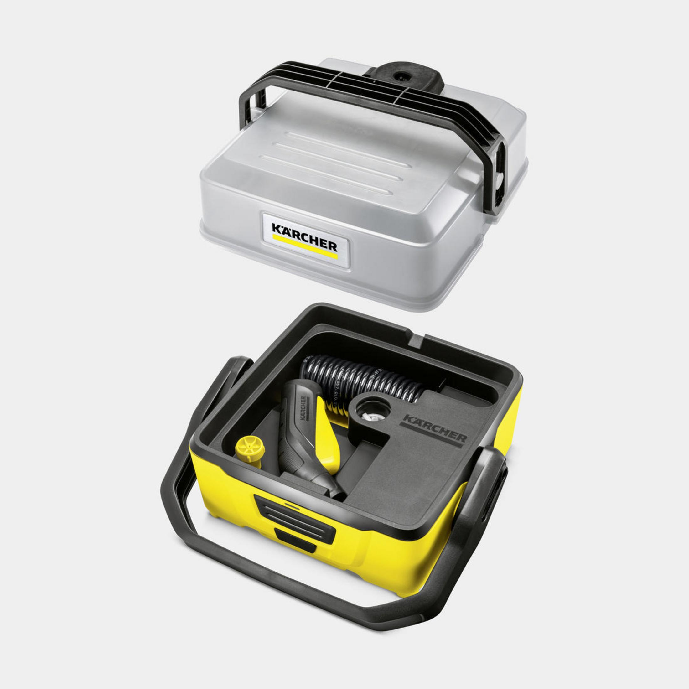 Two Karcher boxes, one gray with a black handle and one yellow with black handle, containing cleaning tools.