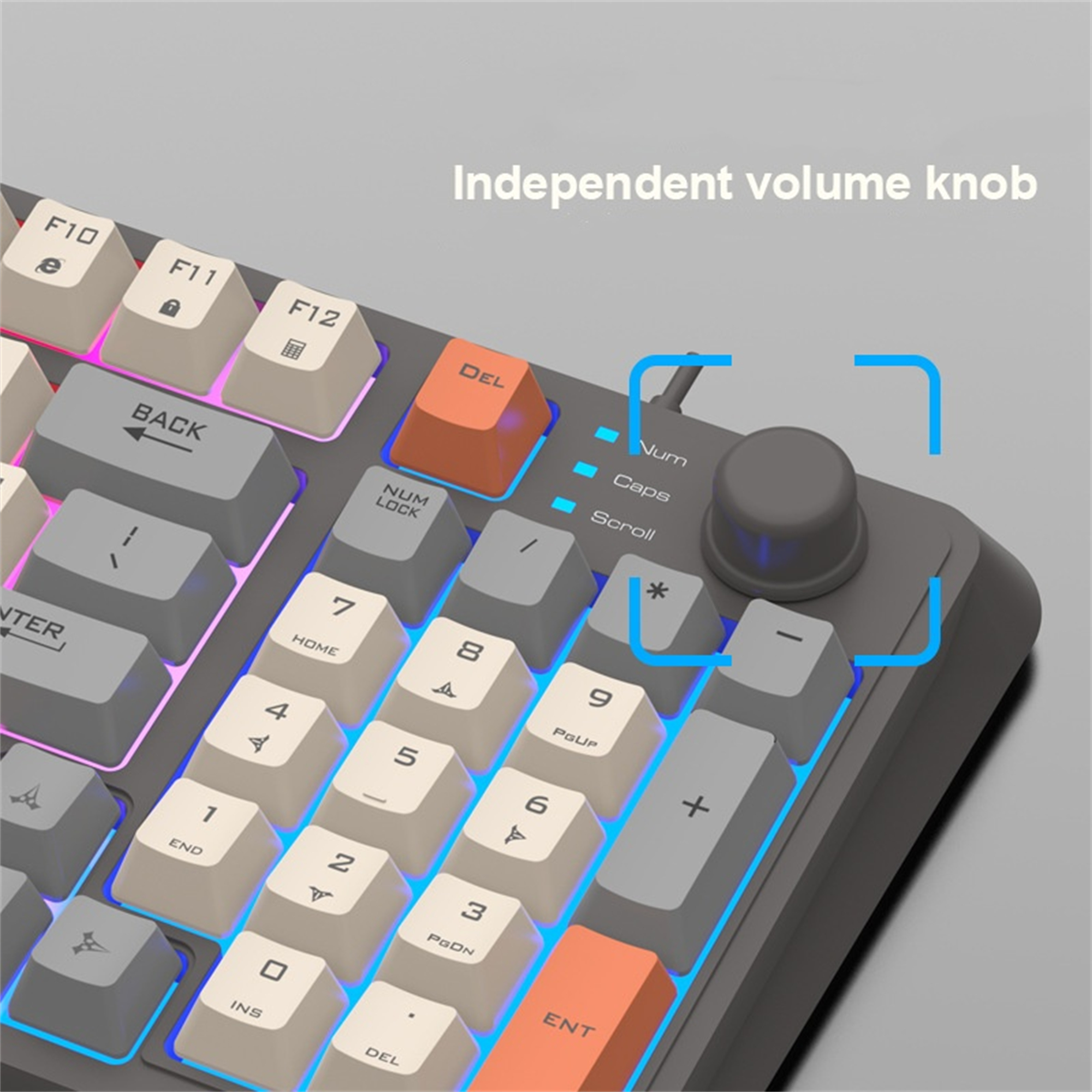 Nahaufnahme einer Tastatur. Graue Tasten, eine orangefarbene Eingabetaste und ein Lautstärkeregler.