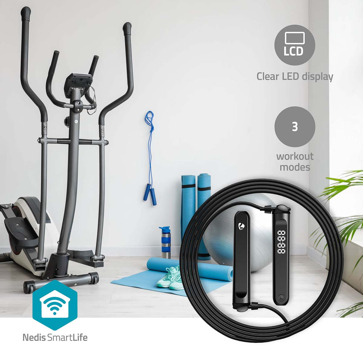 Exercise equipment with a jump rope, elliptical, workout mat, and smart display.