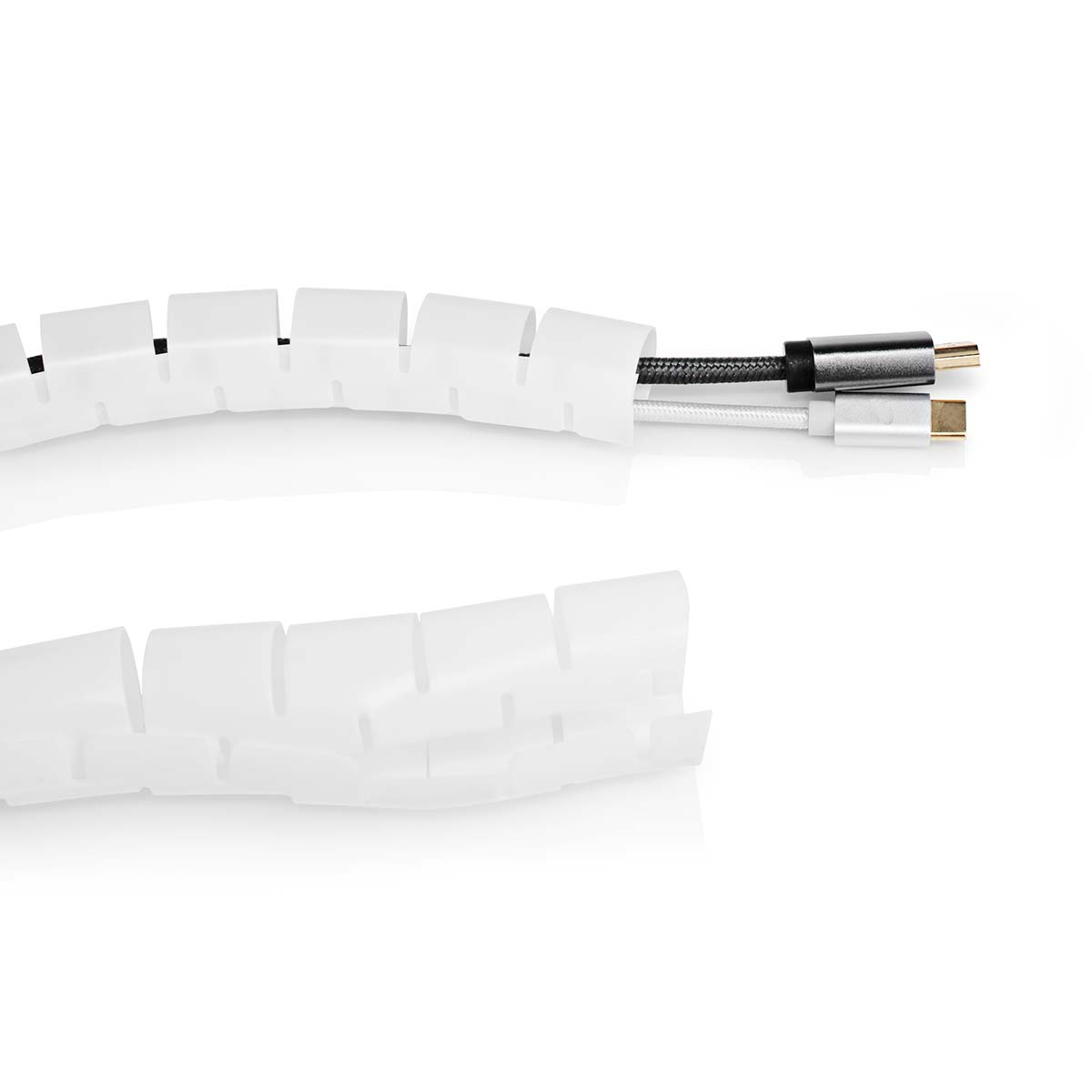 A white cable organizer with cables inserted. The cables are black and gray.