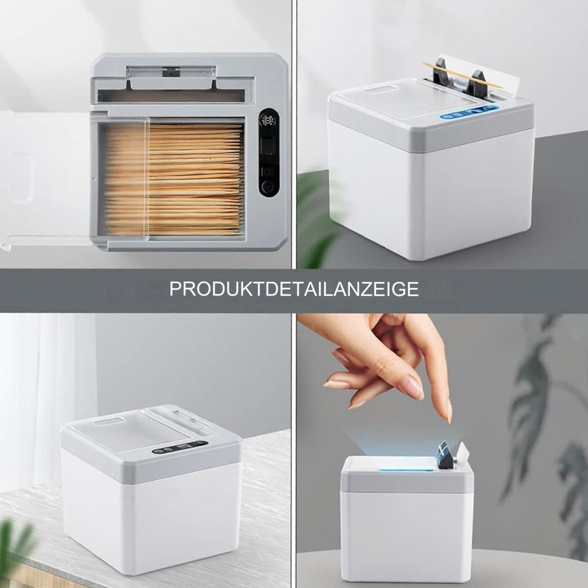 Ein Zahnstocherspender in einer Box mit Anweisungen und einer Hand, die seine Verwendung demonstriert.