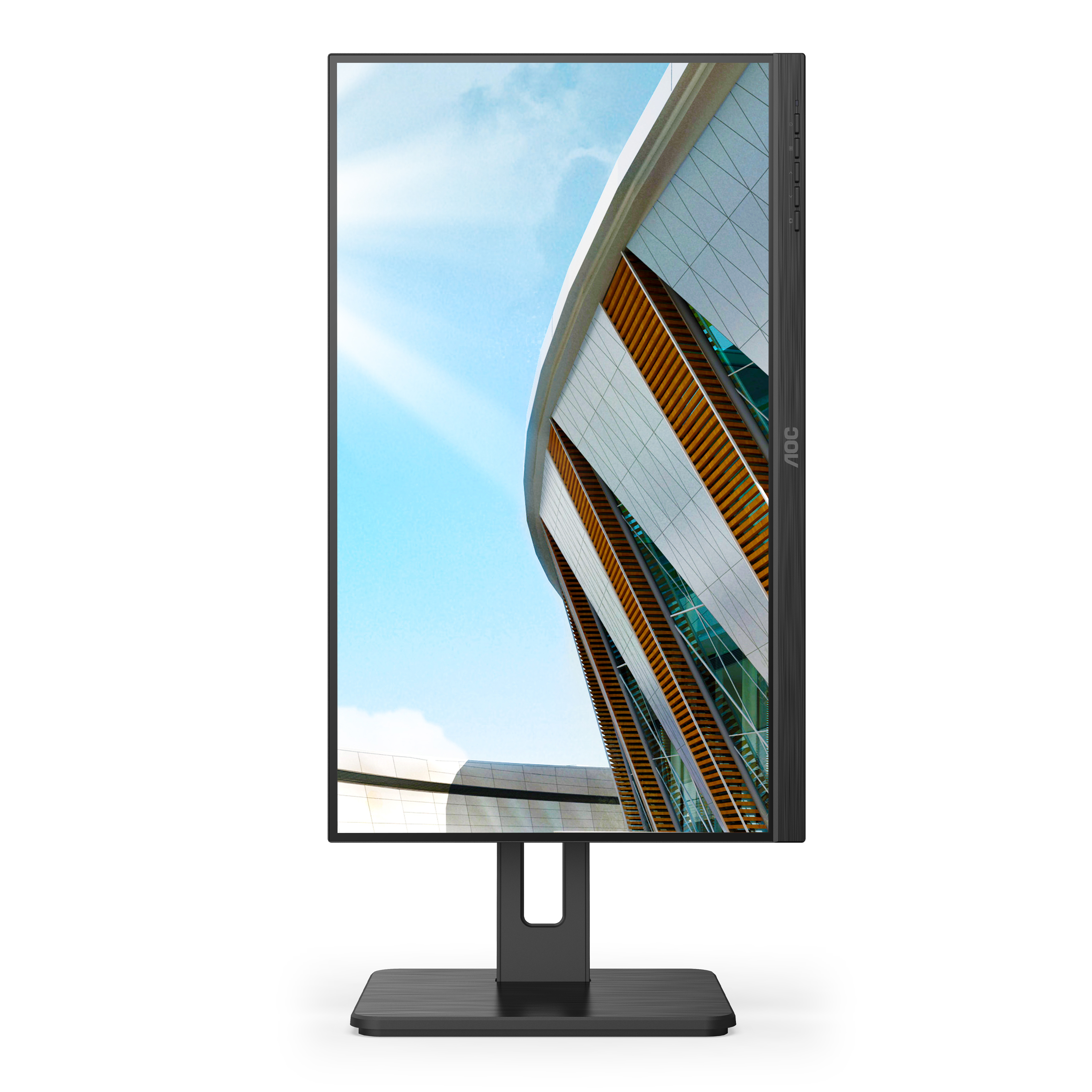Un monitor negro con el logotipo de AOC. La pantalla muestra un exterior de edificio moderno con cielo azul.