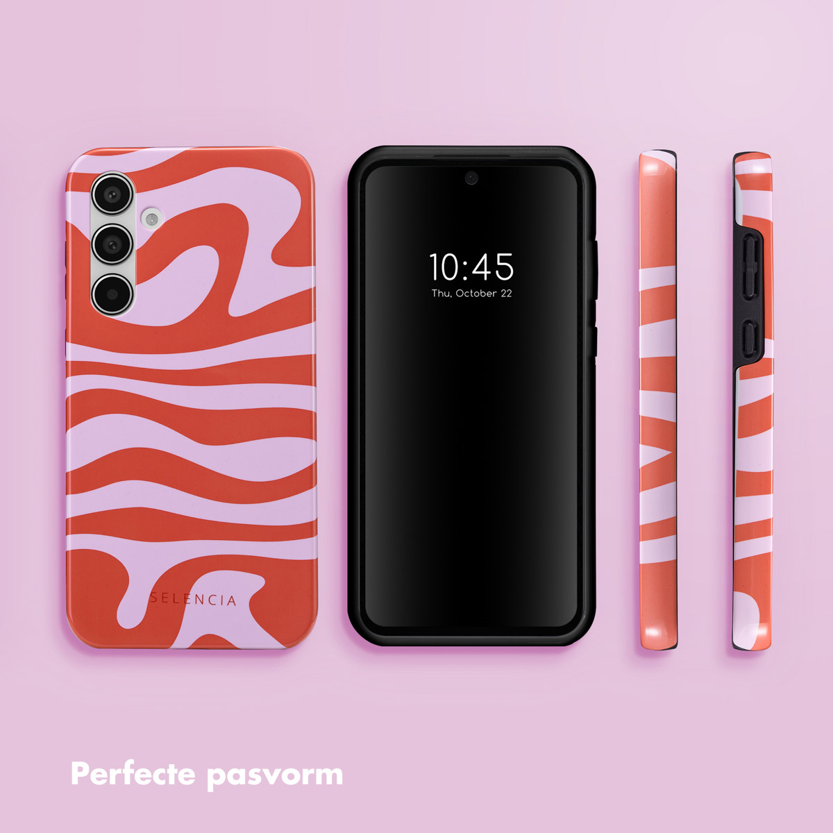 Een telefoonhoesje met een rood en roze golvend patroon, naast een telefoon.