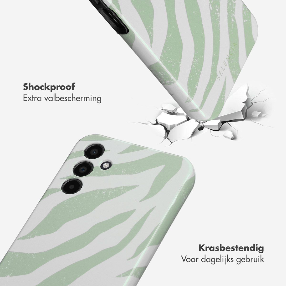 Telefoonhoes impacttest. Hoes met groene zebra strepen die een oppervlak breekt. Witte achtergrond.