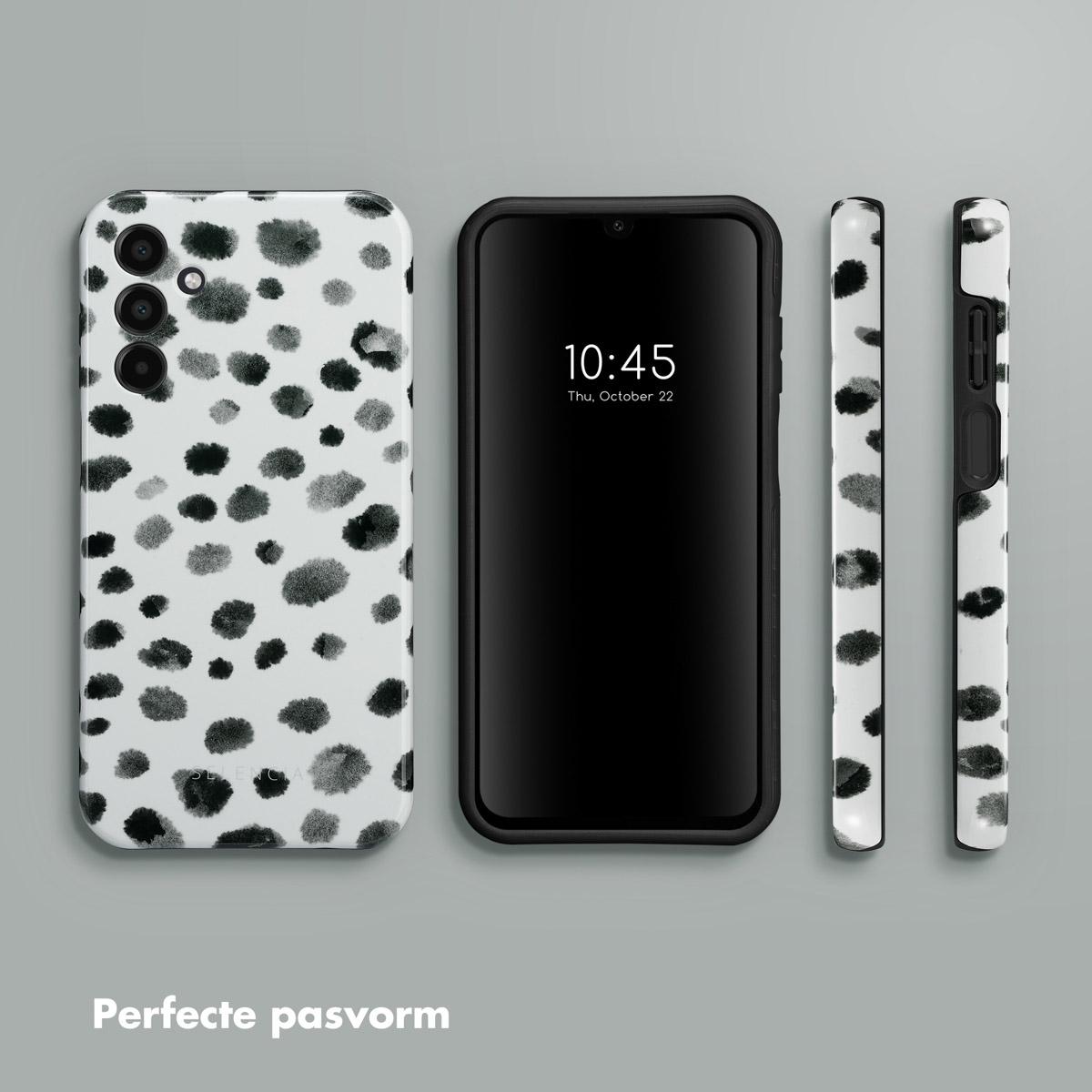 Drie telefoonhoesjes. Eén zit op een telefoon, andere ernaast. De hoes heeft een zwart-wit stippen design.