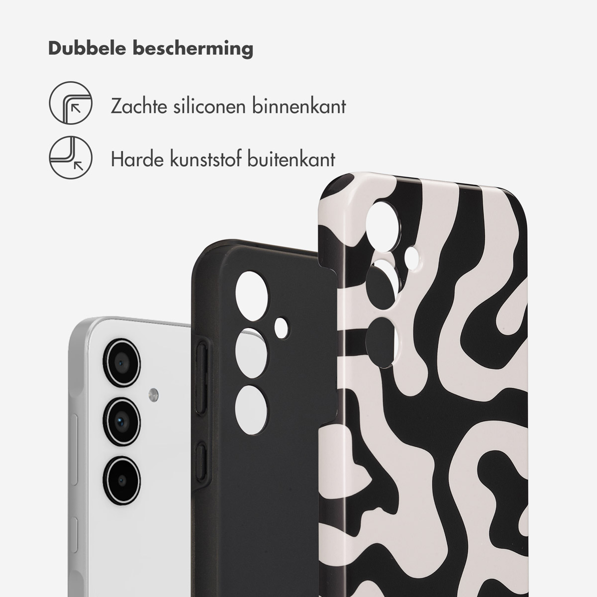 Gros plan sur des coques de téléphone. Une noire, une blanche et une avec un motif ondulé noir et blanc.