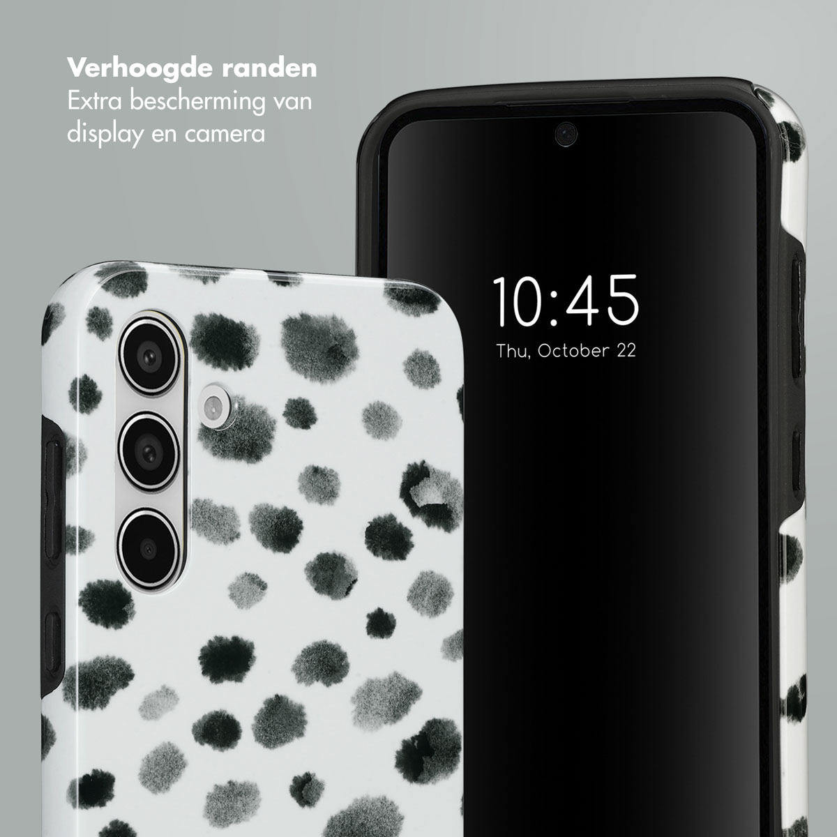 Custodia per telefono bianca con pois neri. Telefono e schermo del telefono che mostra ora e data.