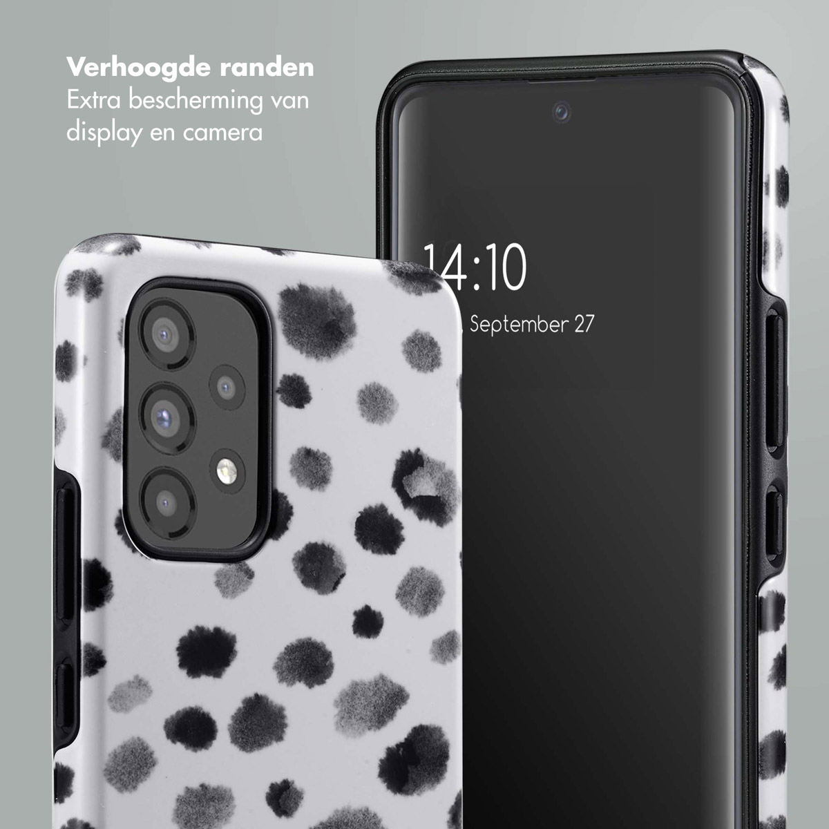 Coque de téléphone avec imprimé dalmatien noir et blanc et téléphone.