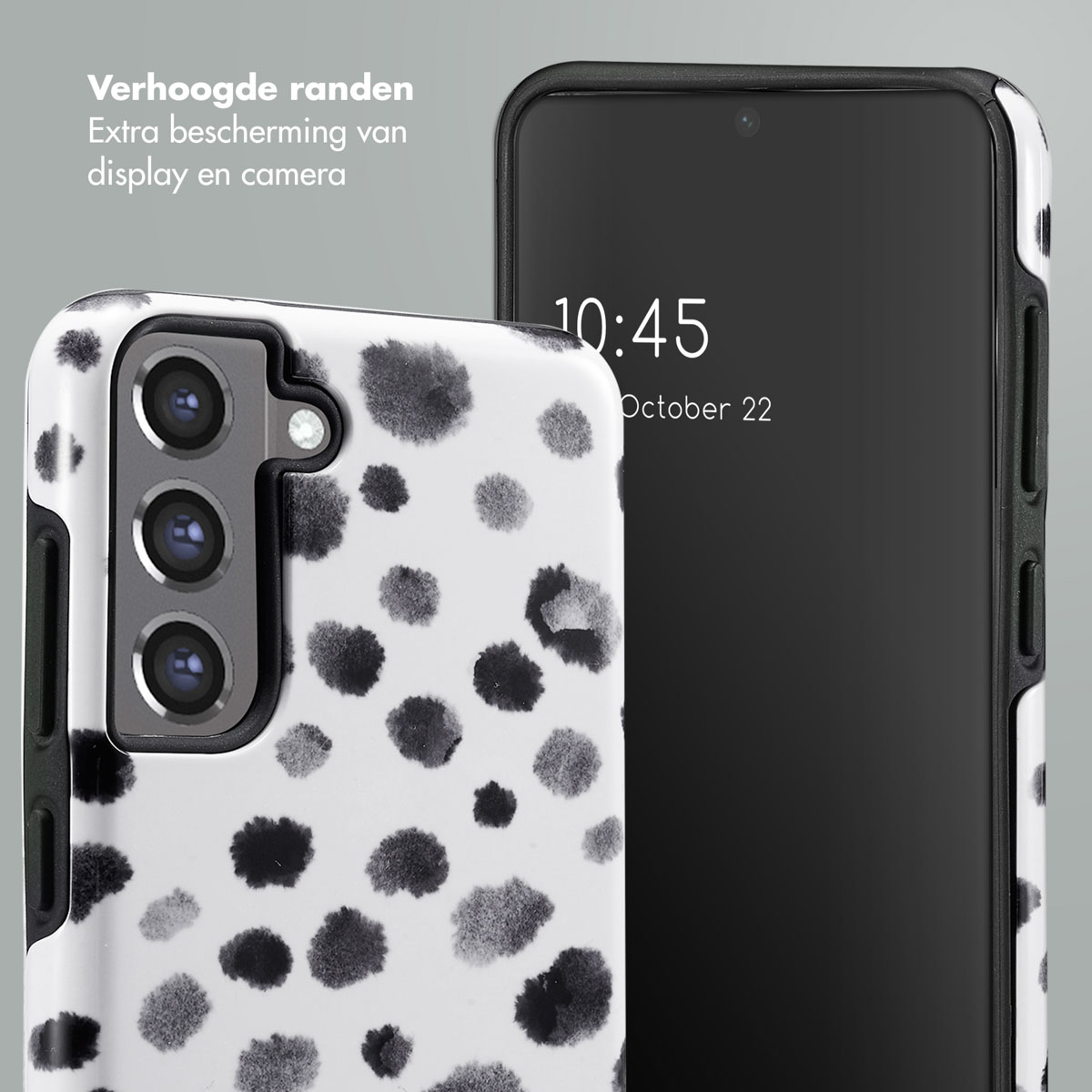 Custodia per telefono con pois bianchi e neri. Il telefono nero mostra le 10:45, 22 ottobre.