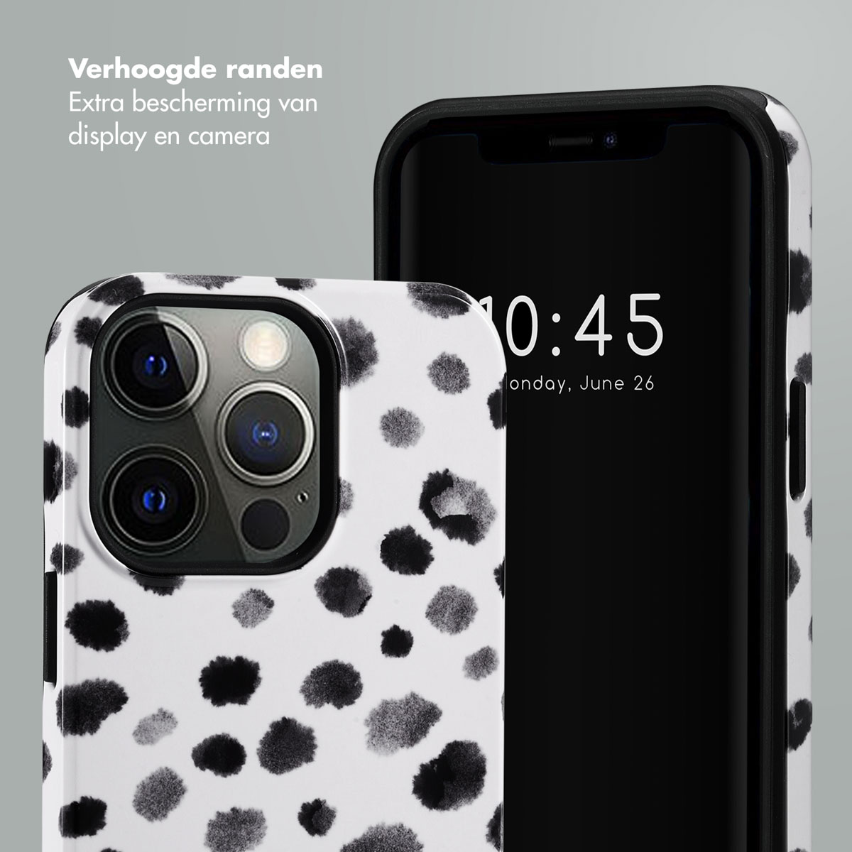 Zwart-witte dalmatiër print telefoonhoes naast een telefoon met zwart scherm.