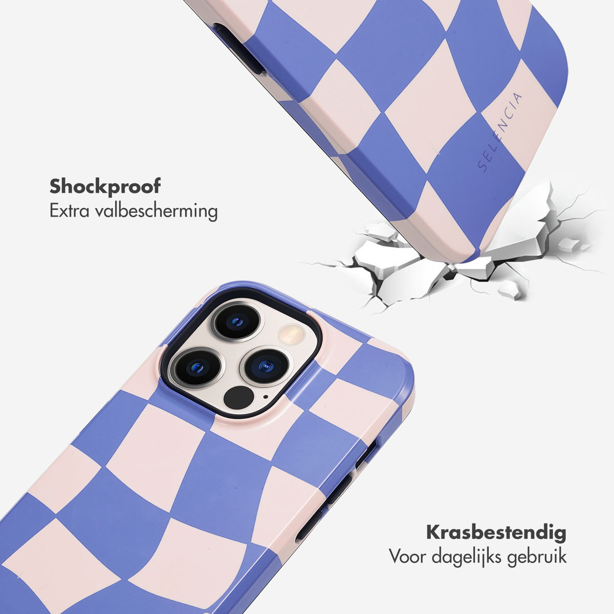 Telefoon en telefoonhoesje met blauw en roze geblokt ontwerp. De telefoon is kapot.