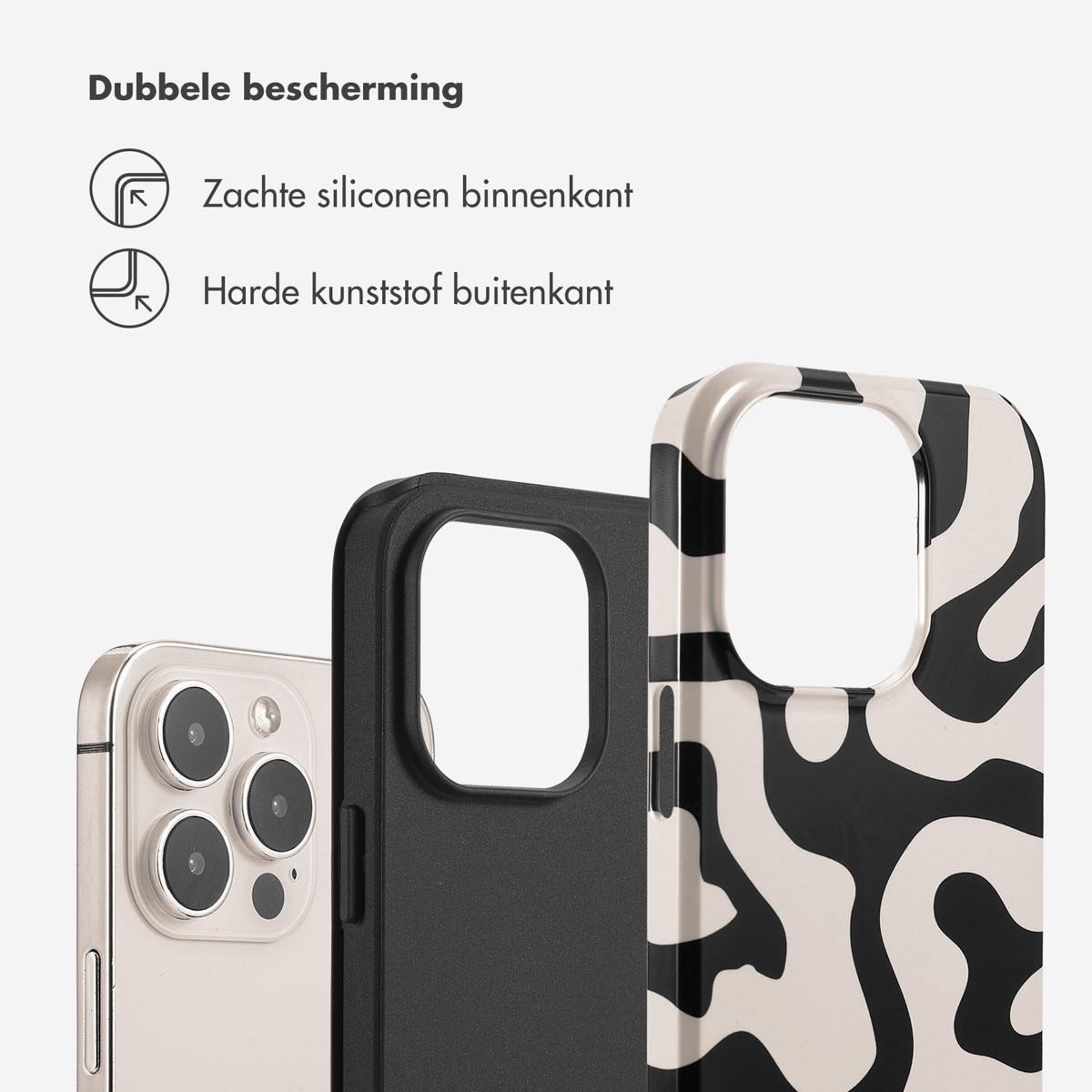 Coque ondulée noire et crème, téléphone noir, intérieur souple et extérieur dur. Trois objets.
