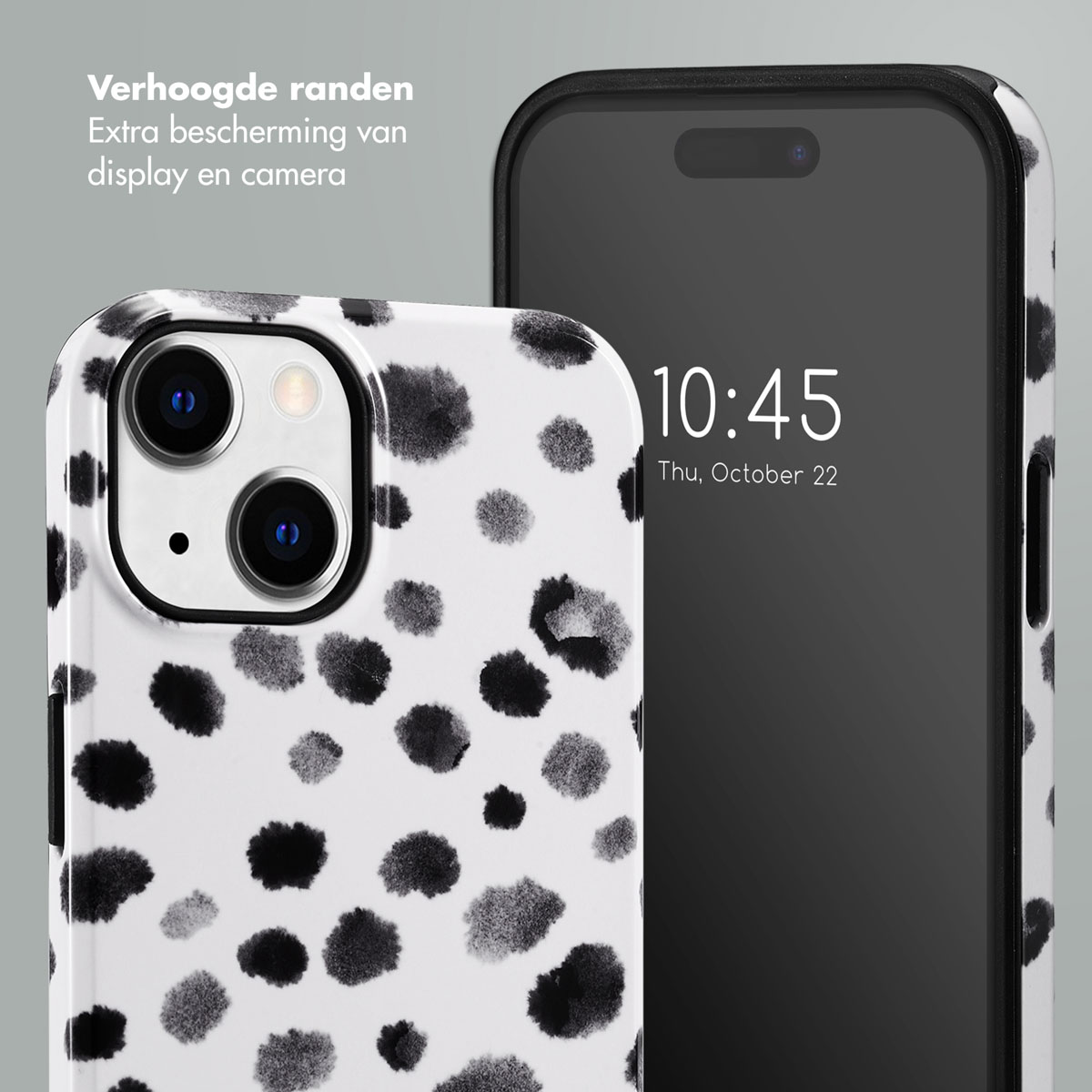 Coque blanche à pois noirs et téléphone noir. Heure : 10h45. Date : Jeu. 22 octobre.