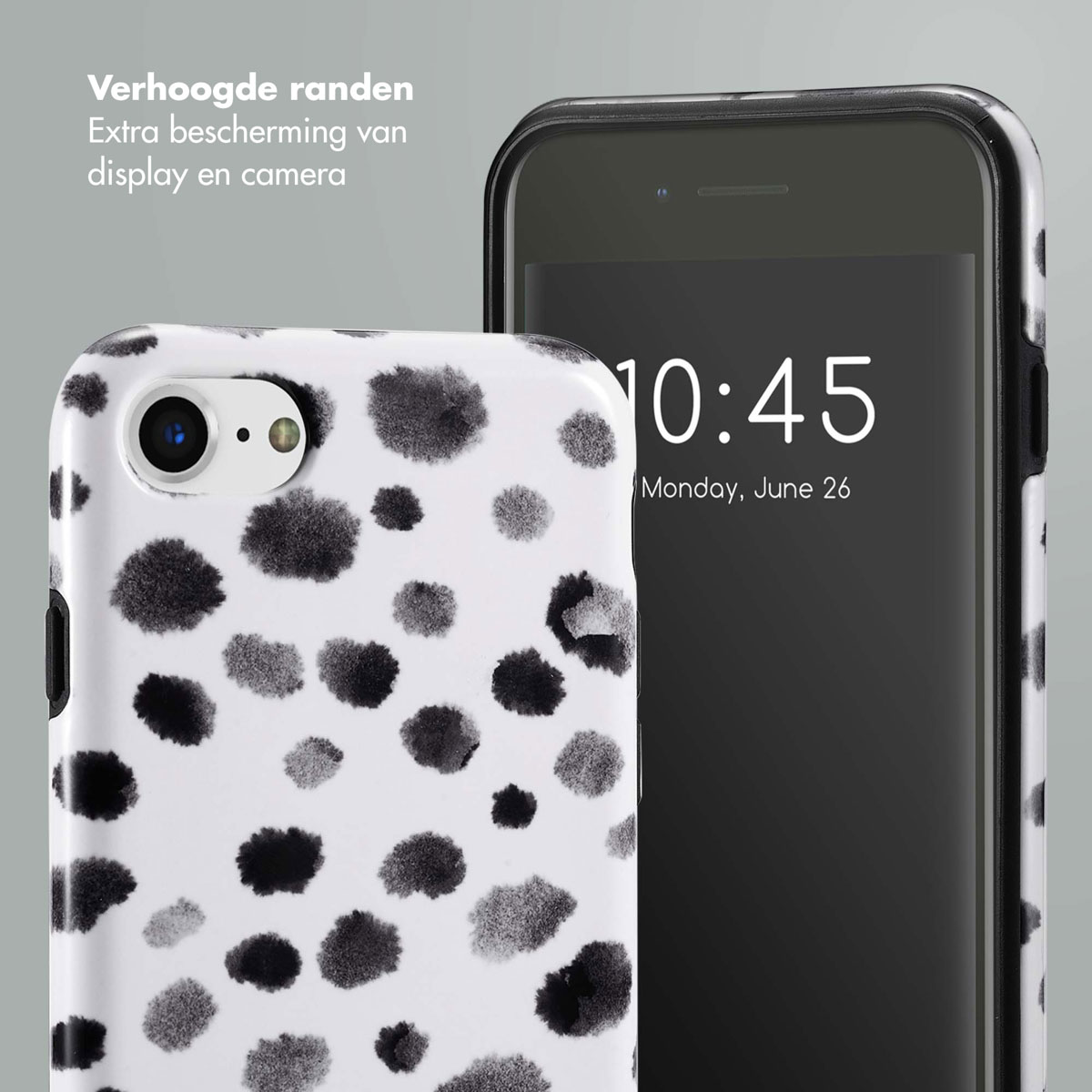 Telefoon en hoesjes met zwart-witte Dalmatische vlekken. De telefoon toont 10:45 op maandag 26 juni.