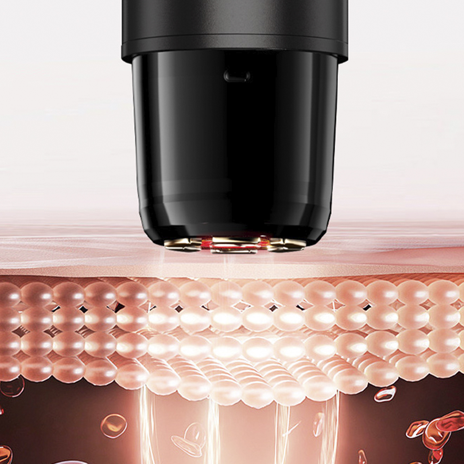 Un dispositivo negro con luz roja se presiona sobre la piel. El dispositivo parece ser para tratamiento de la piel.
