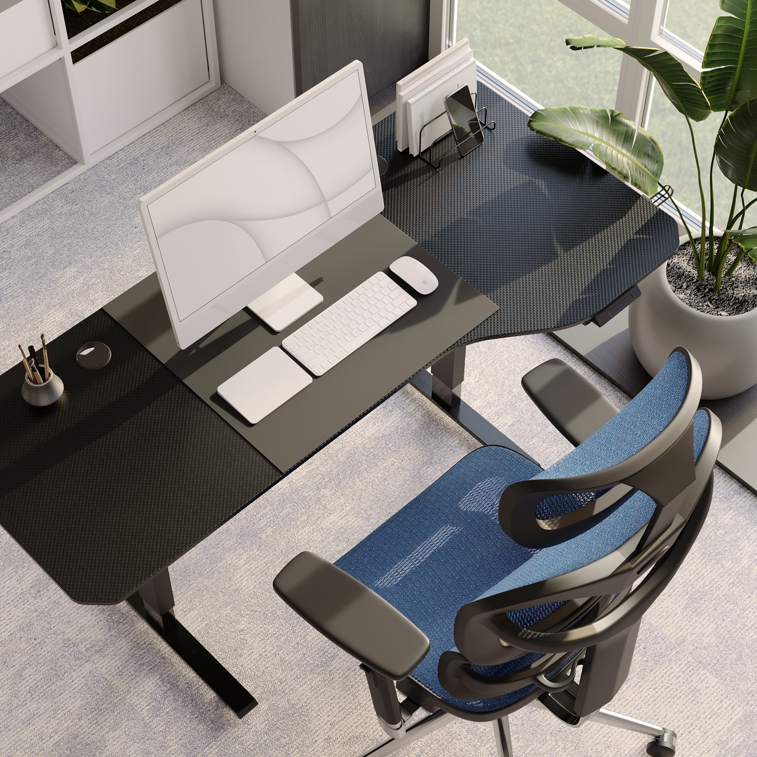 Biurko z komputerem, klawiaturą, myszą i krzesłem widziane z góry.