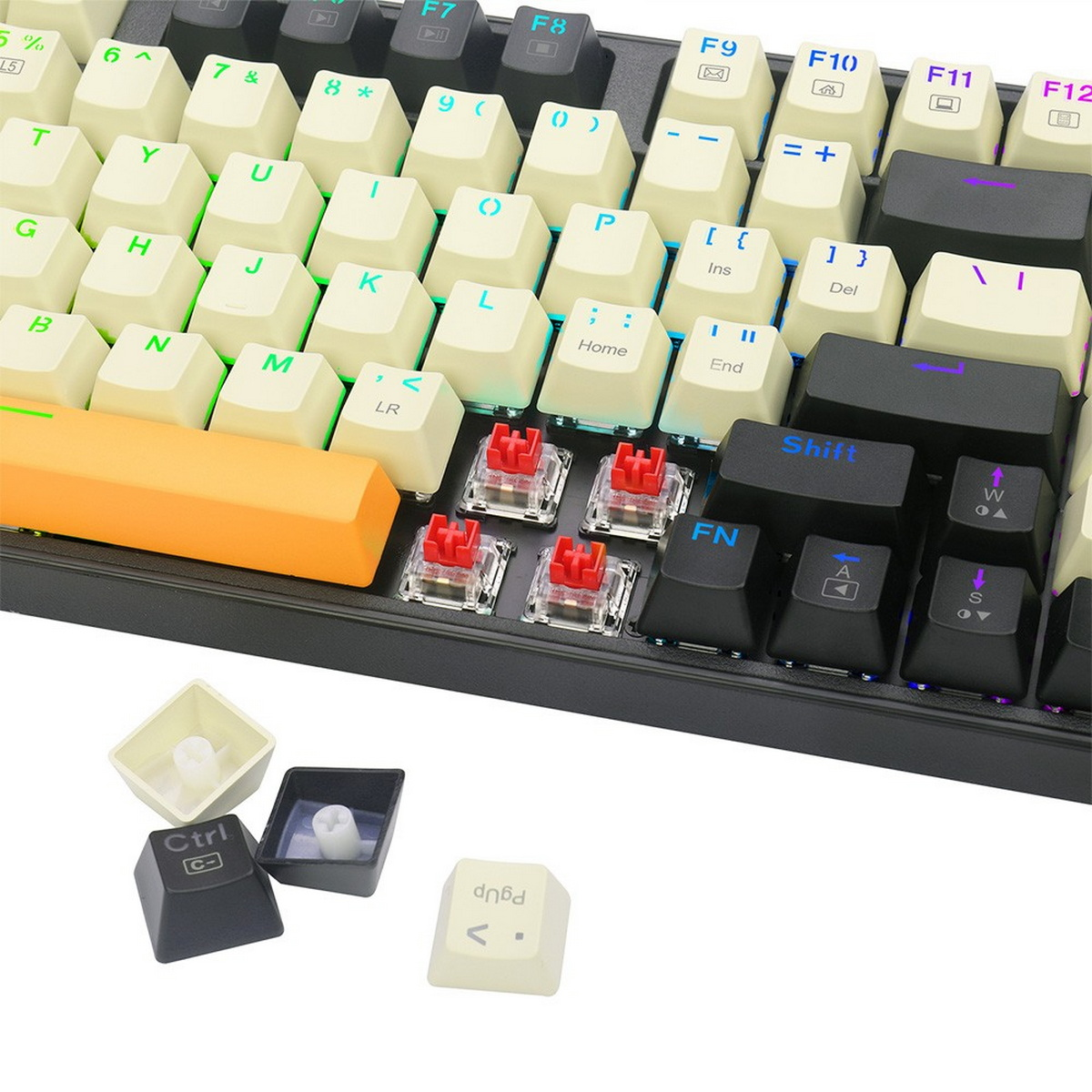 Zbliżenie klawiatury z kremowymi klawiszami, czerwonymi przełącznikami i zdjętymi nakładkami.