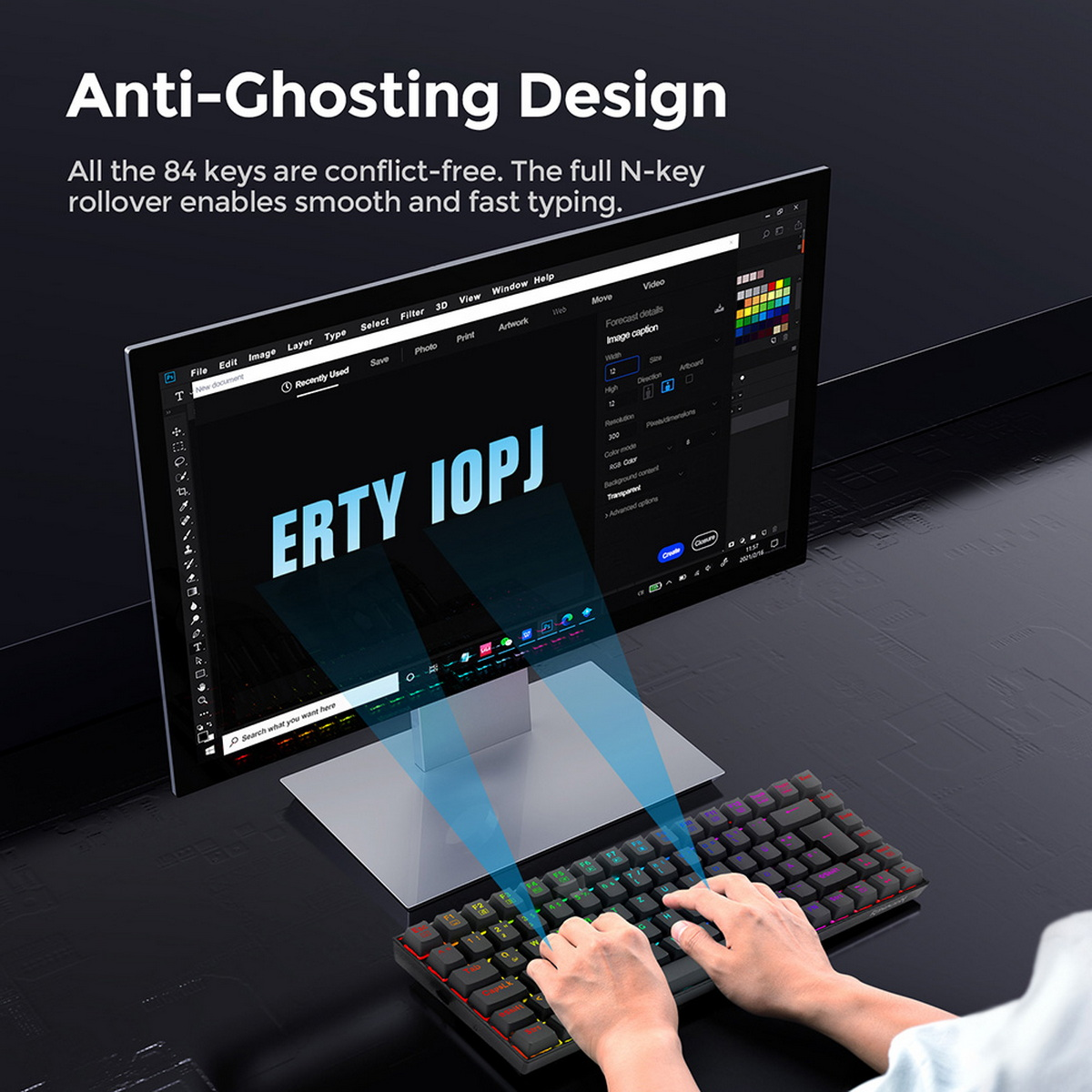Klawiatura komputera z kolorowymi klawiszami, monitor wyświetlający interfejs projektowania.