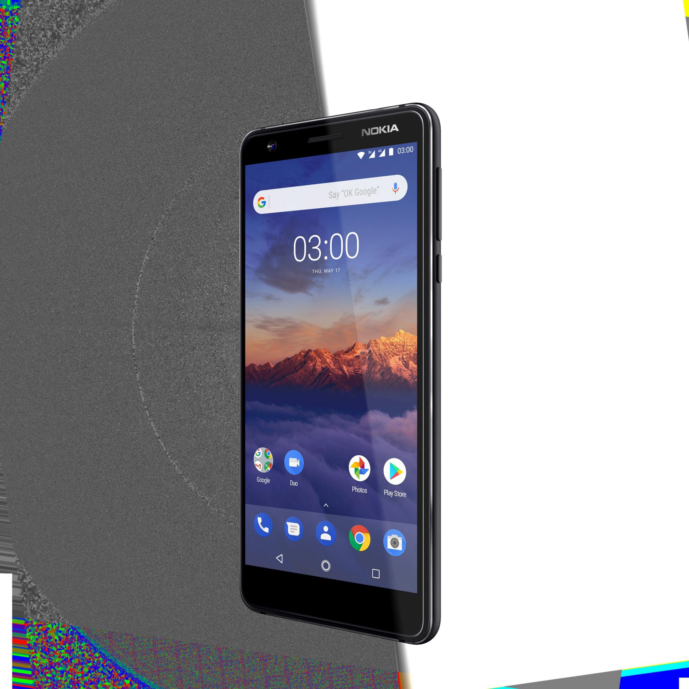 Nokia-Handy mit Berg-Bildschirm. Die Zeit ist 03:00 Uhr. Das Telefon ist schwarz mit schwarzem Rahmen.