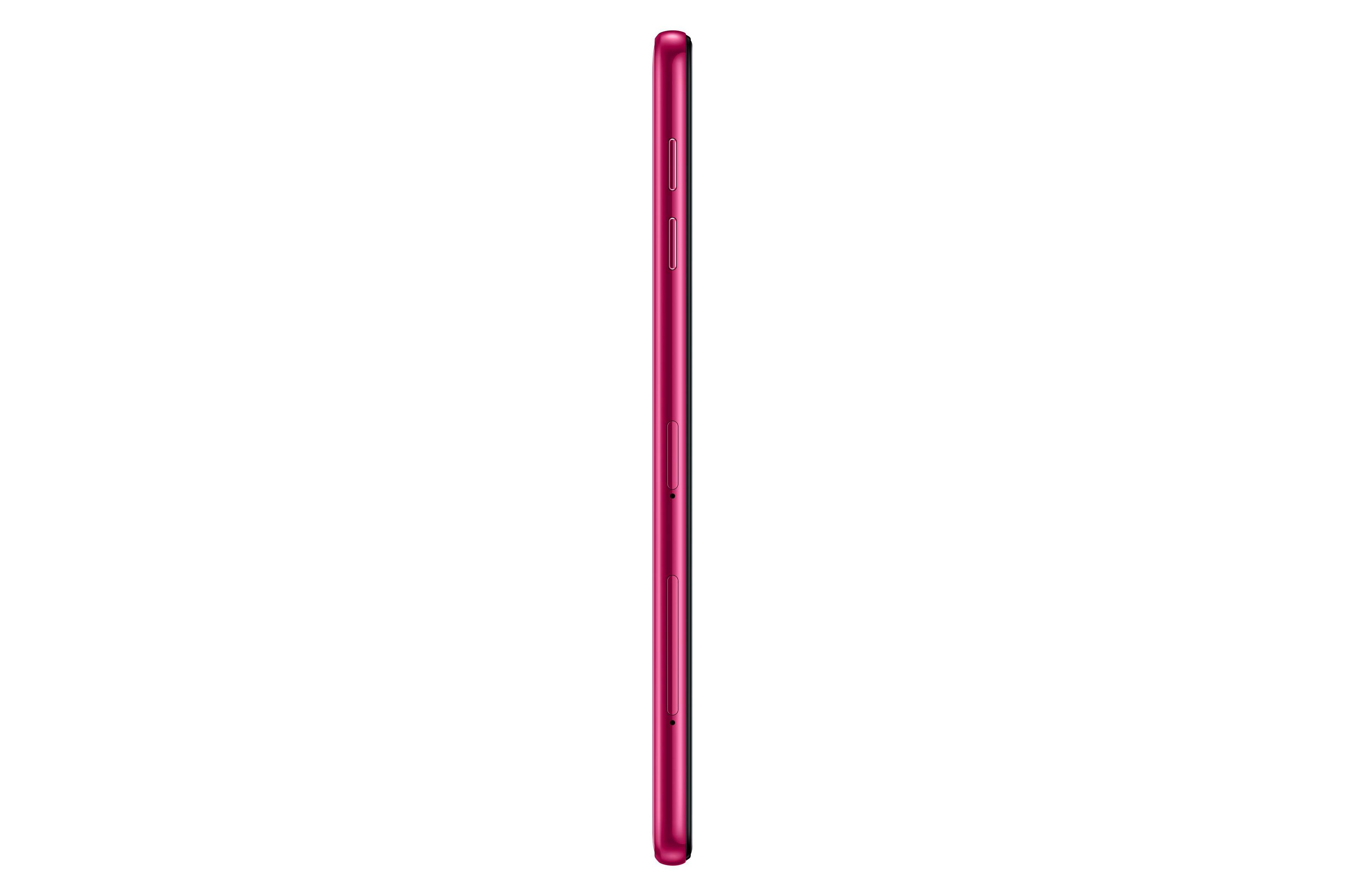 Ein dünnes, magenta Smartphone von der Seite gesehen, mit Kamera und Knöpfen.