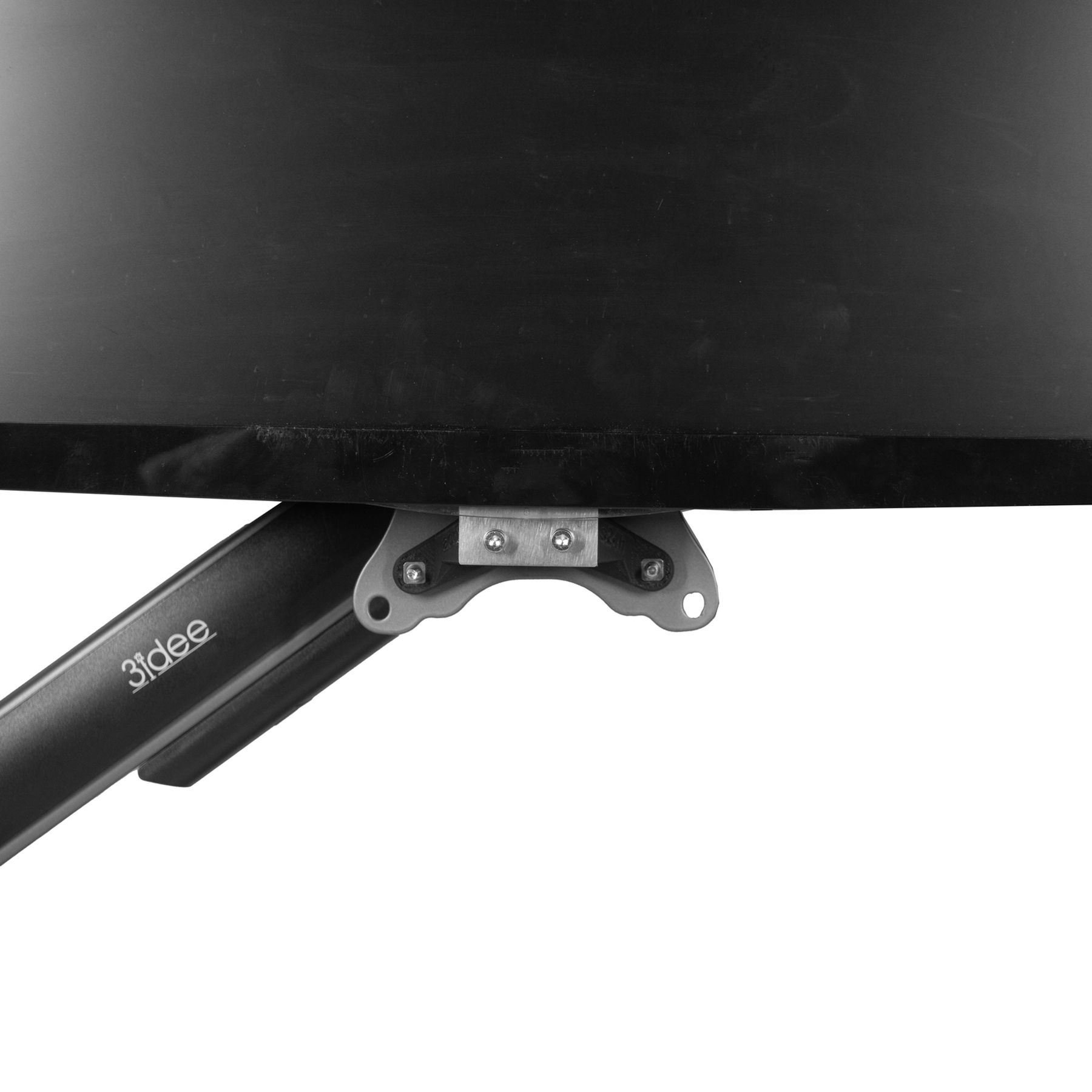 Die Unterseite eines schwarzen Computermonitors. Der Monitor ist an einem Arm befestigt.