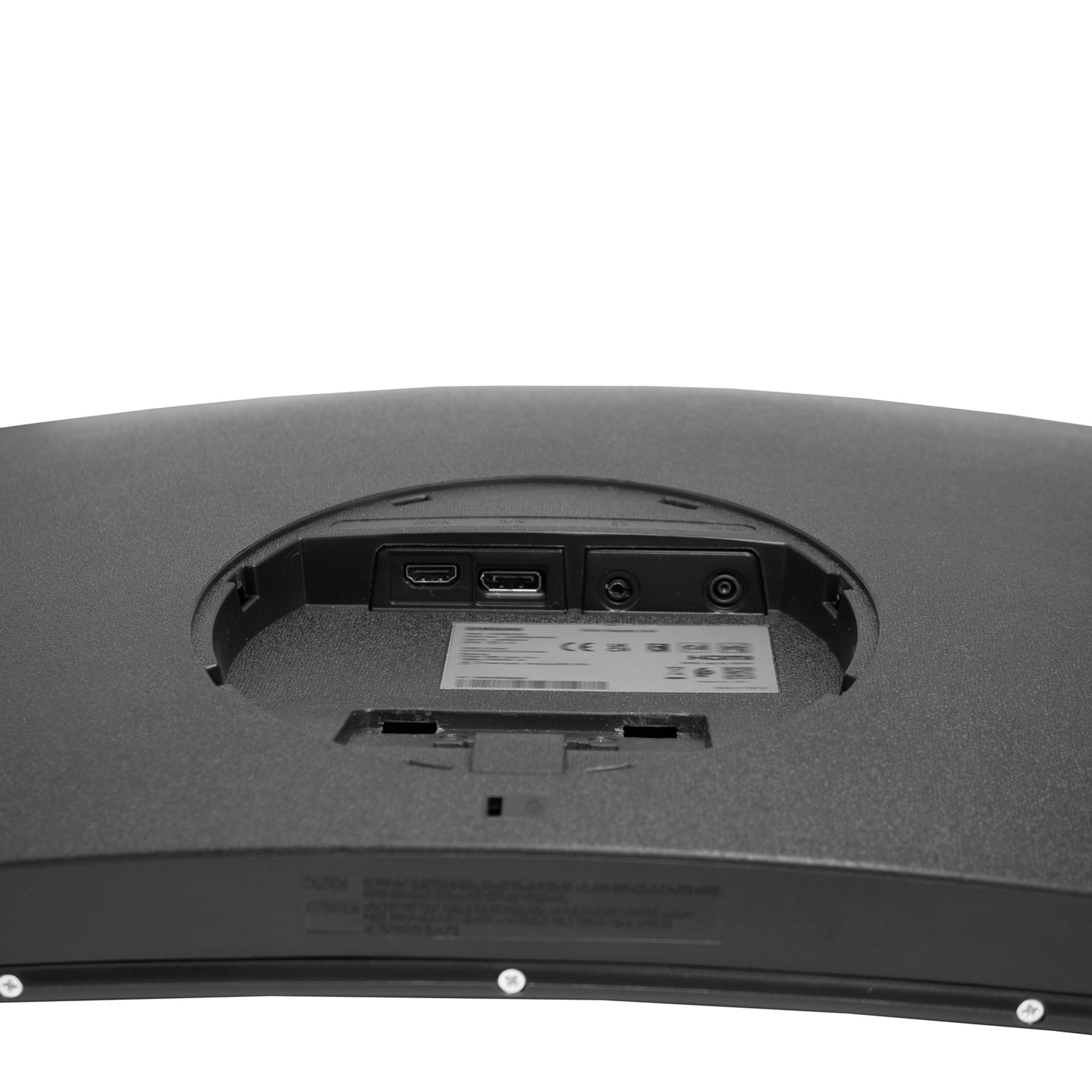 Rückseite eines schwarzen, gebogenen Monitors. Zeigt HDMI-, USB- und Audioanschlüsse, mit Schrauben sichtbar.