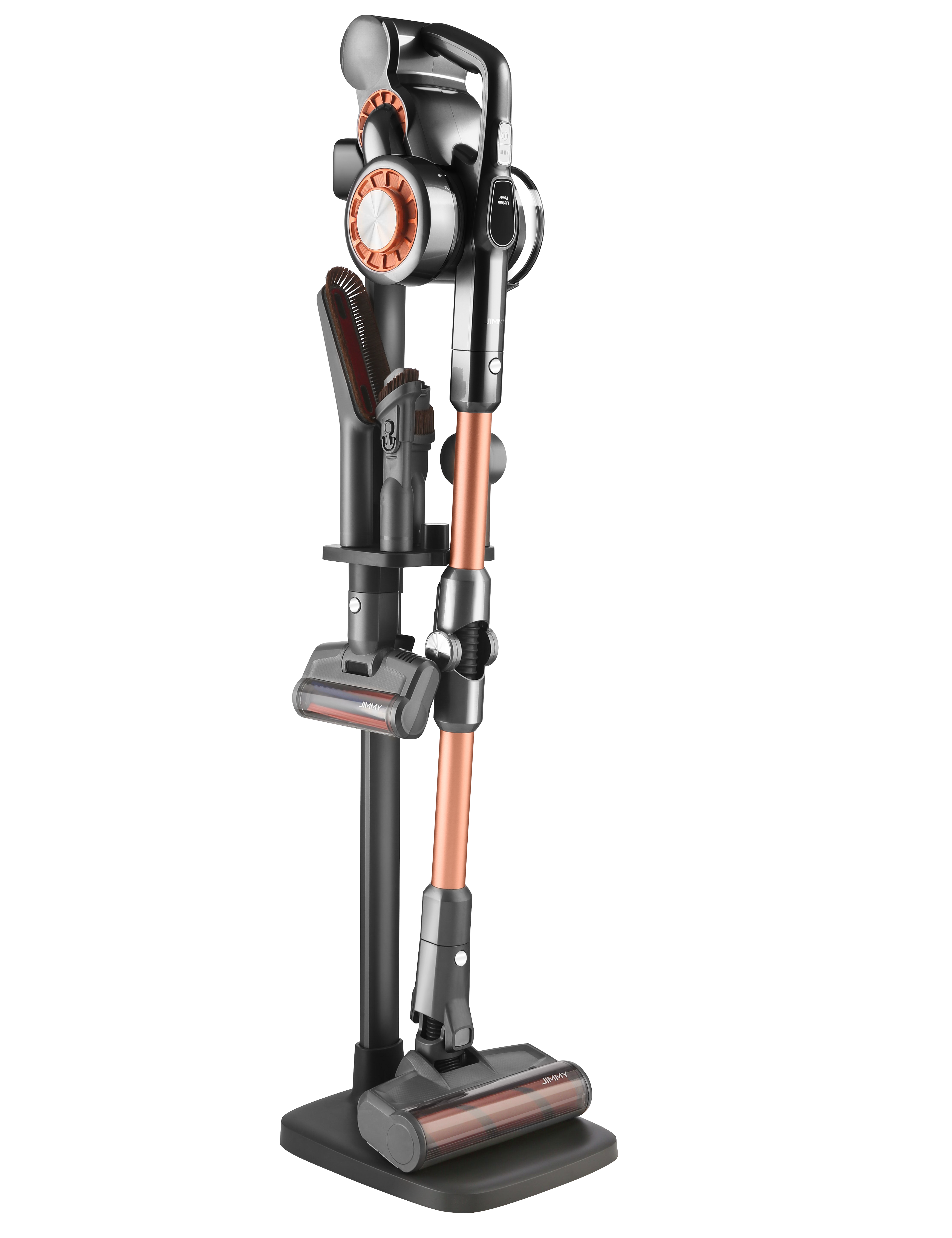 Aufrechter Staubsauger auf einem Ständer. Orange und schwarze Farben. Schwarzer Hintergrund.