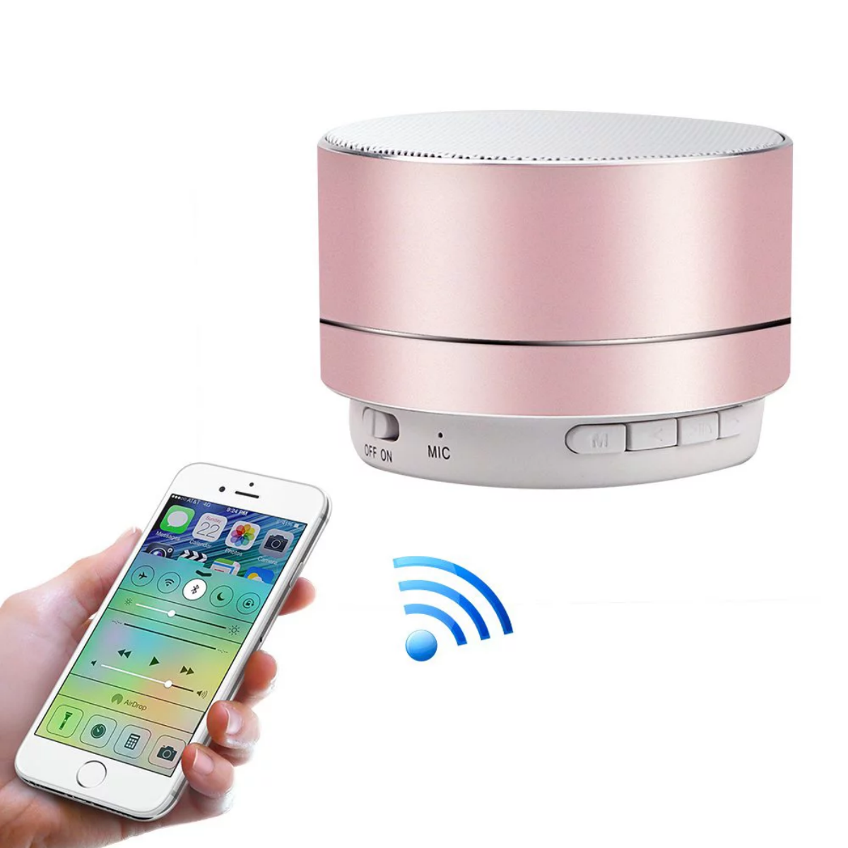 Rosa-silberner Lautsprecher neben einem Telefon mit Musiksteuerung. Rechts ein WLAN-Symbol.