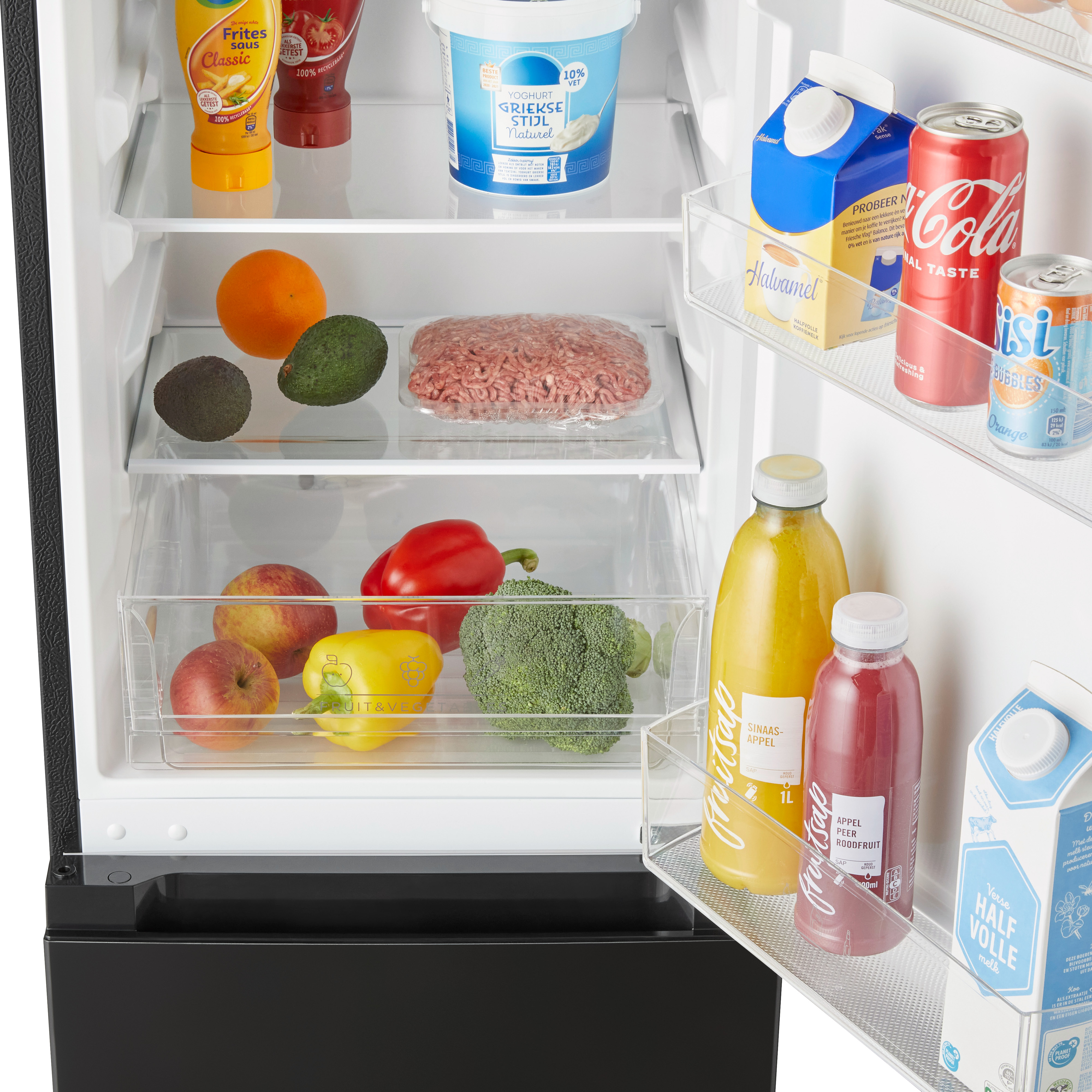 Open fridge with groceries: fruits, meat, drinks.