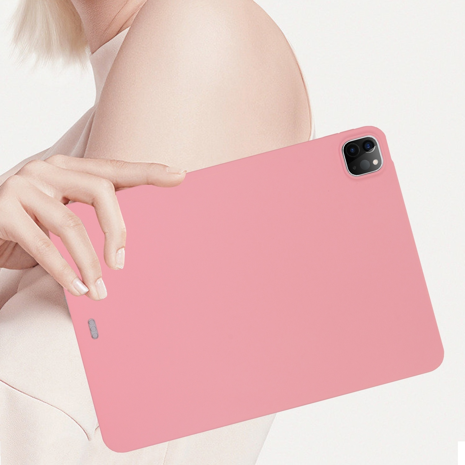 Ein rosa Tablet, das von einer Person gehalten wird. Das Tablet hat eine Kamera und ist in einem rosa Gehäuse.