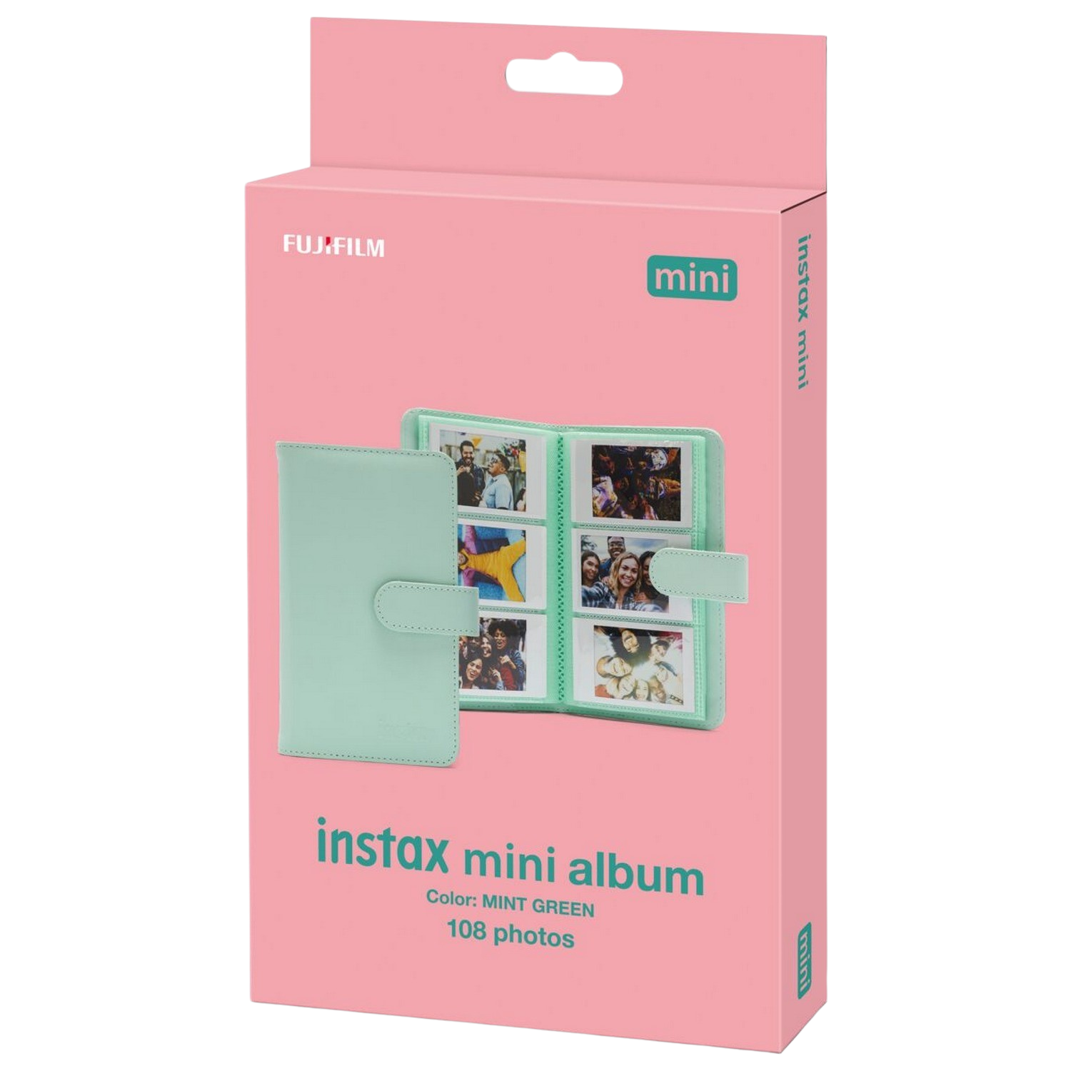 Różowe pudełko z miętowo-zielonym albumem Instax Mini. Album jest otwarty ze widocznymi zdjęciami.