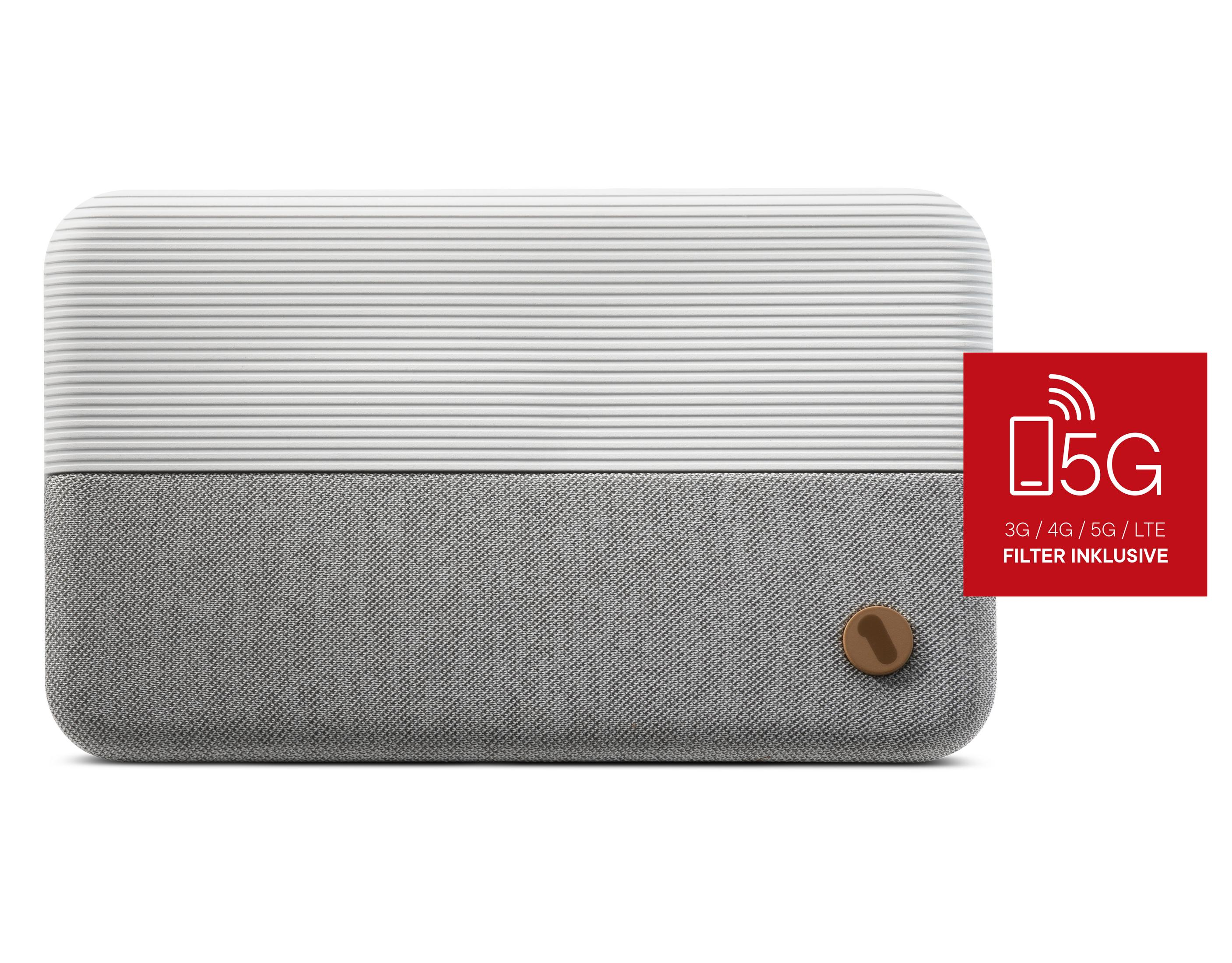 Biało-szare urządzenie z logo 5G. Ma przycisk i tekst wskazujący na dołączony filtr.