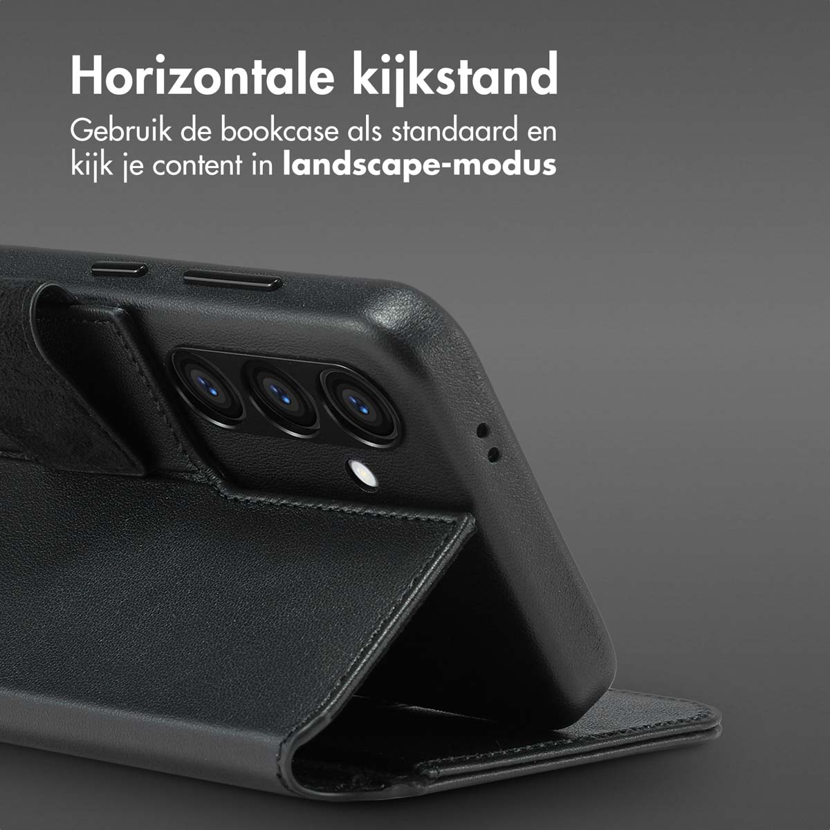 Zwarte telefoonhoes met een telefoon erin. De hoes kan als standaard worden gebruikt. Tekst: Horizontale kijkstand.