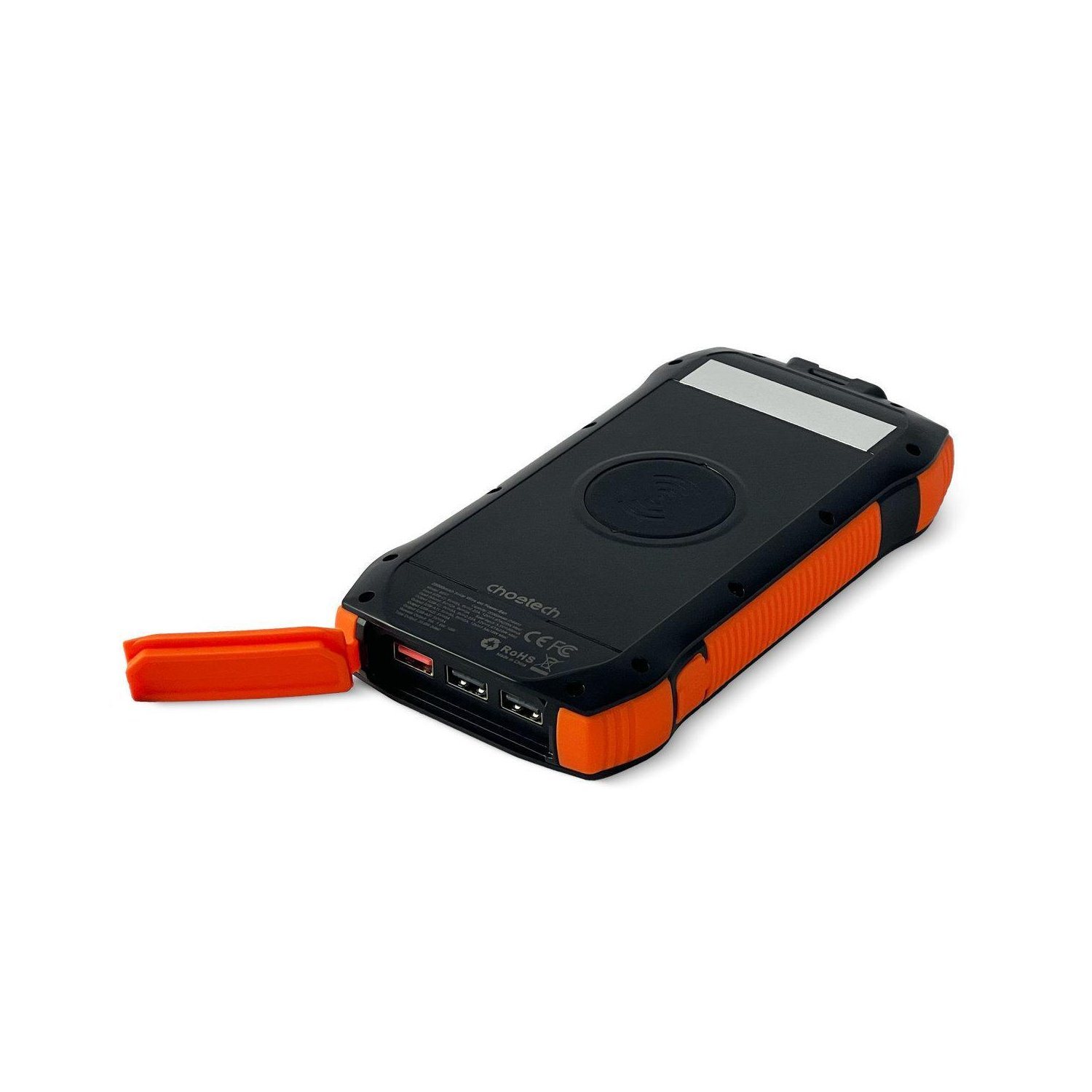 Schwarze und orangefarbene Powerbank mit Ladeanschlüssen und drahtloser Ladefläche.