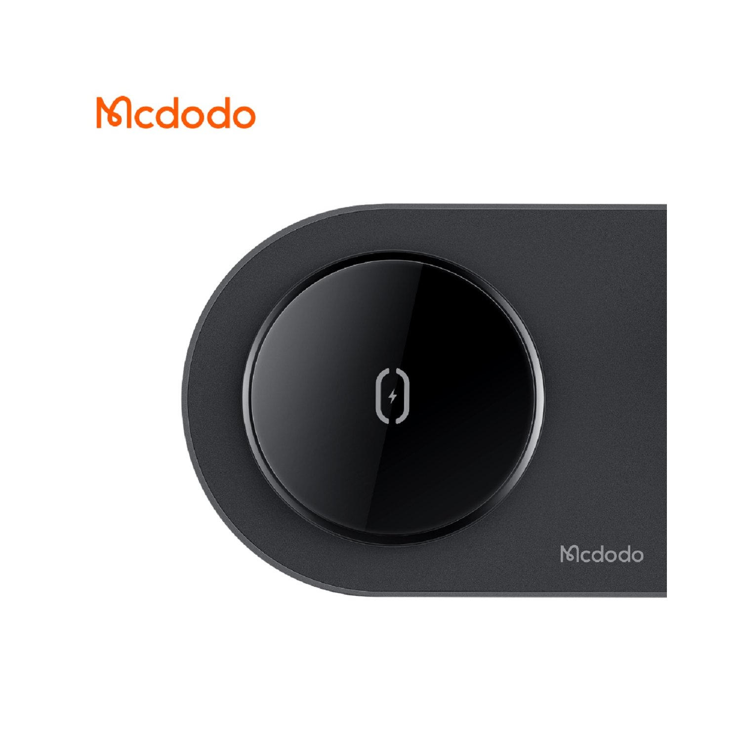 Nahaufnahme eines schwarzen, kreisförmigen kabellosen Ladegeräts mit Mcdodo-Logo. Ein Telefonsymbol ist sichtbar.