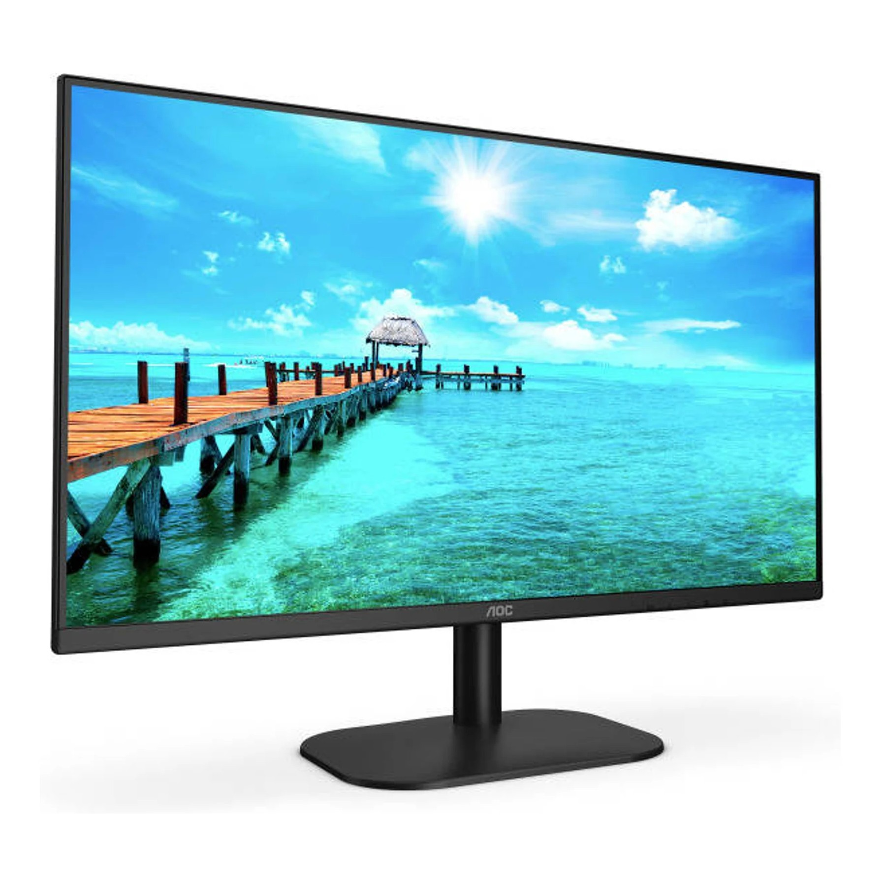 Un monitor de computadora muestra una escena costera con un muelle de madera que se extiende hacia el mar turquesa.