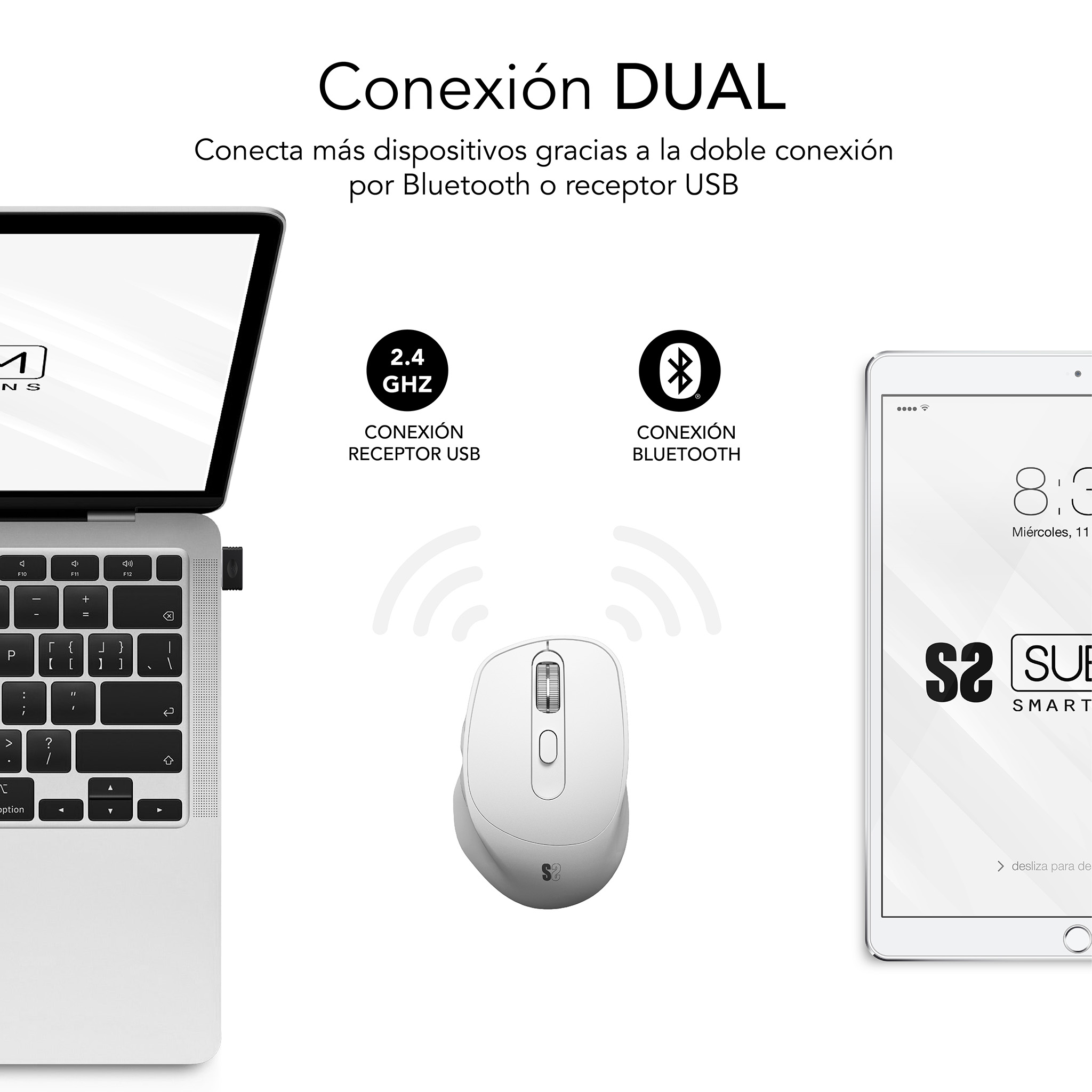 Un mouse bianco vicino a un laptop e un tablet. Il laptop ha un ricevitore USB collegato.