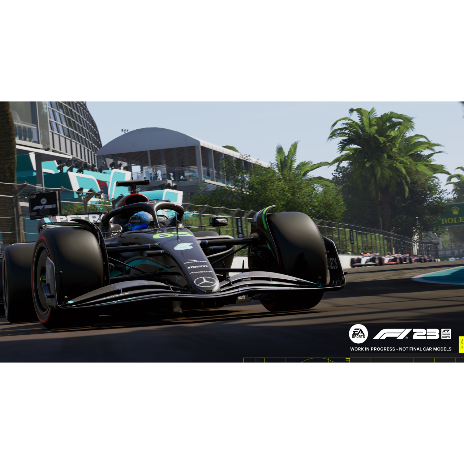 Scena z gry F1 23 z samochodem wyścigowym na torze.