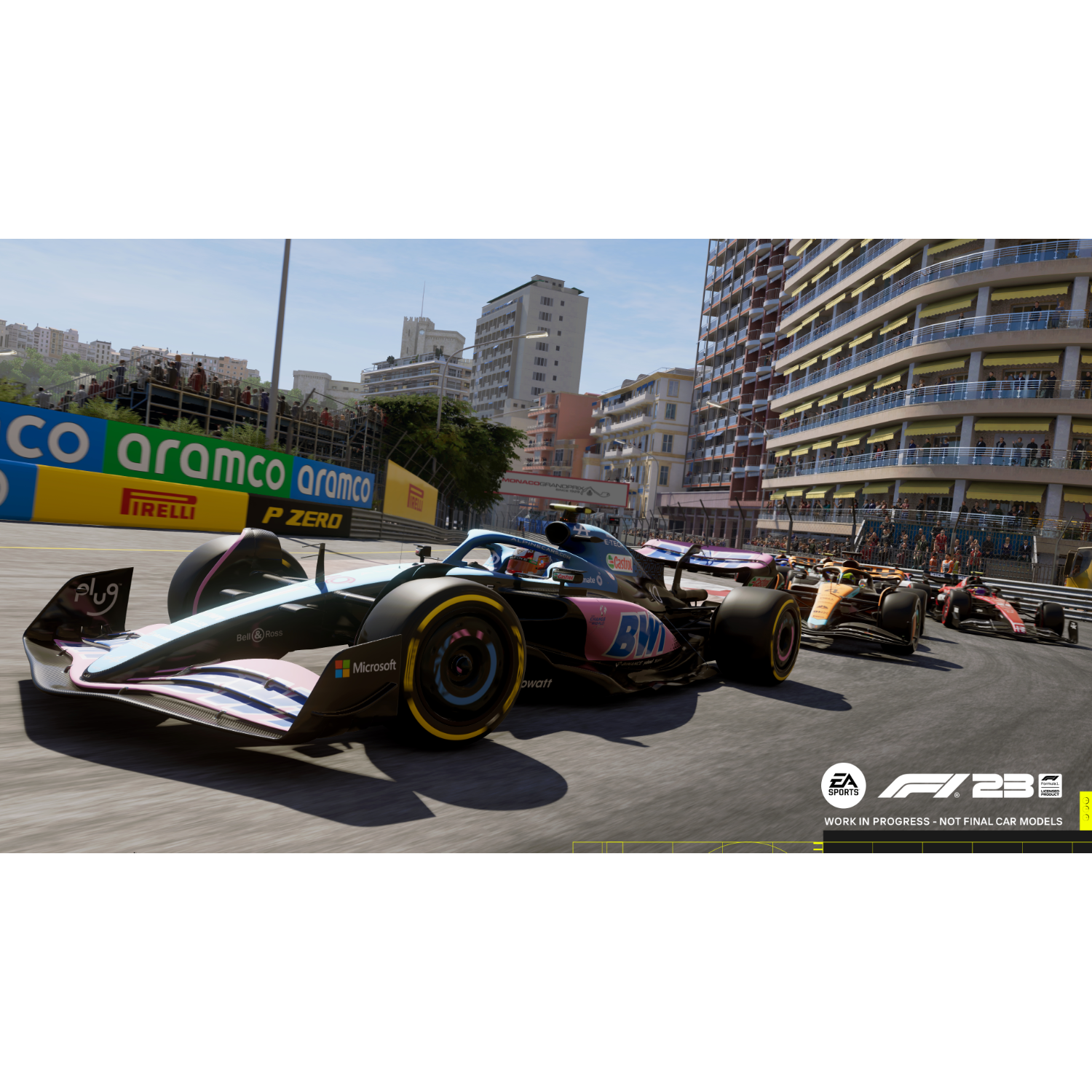 Wyścig F1, samochody na torze, widoczne loga sponsorów.