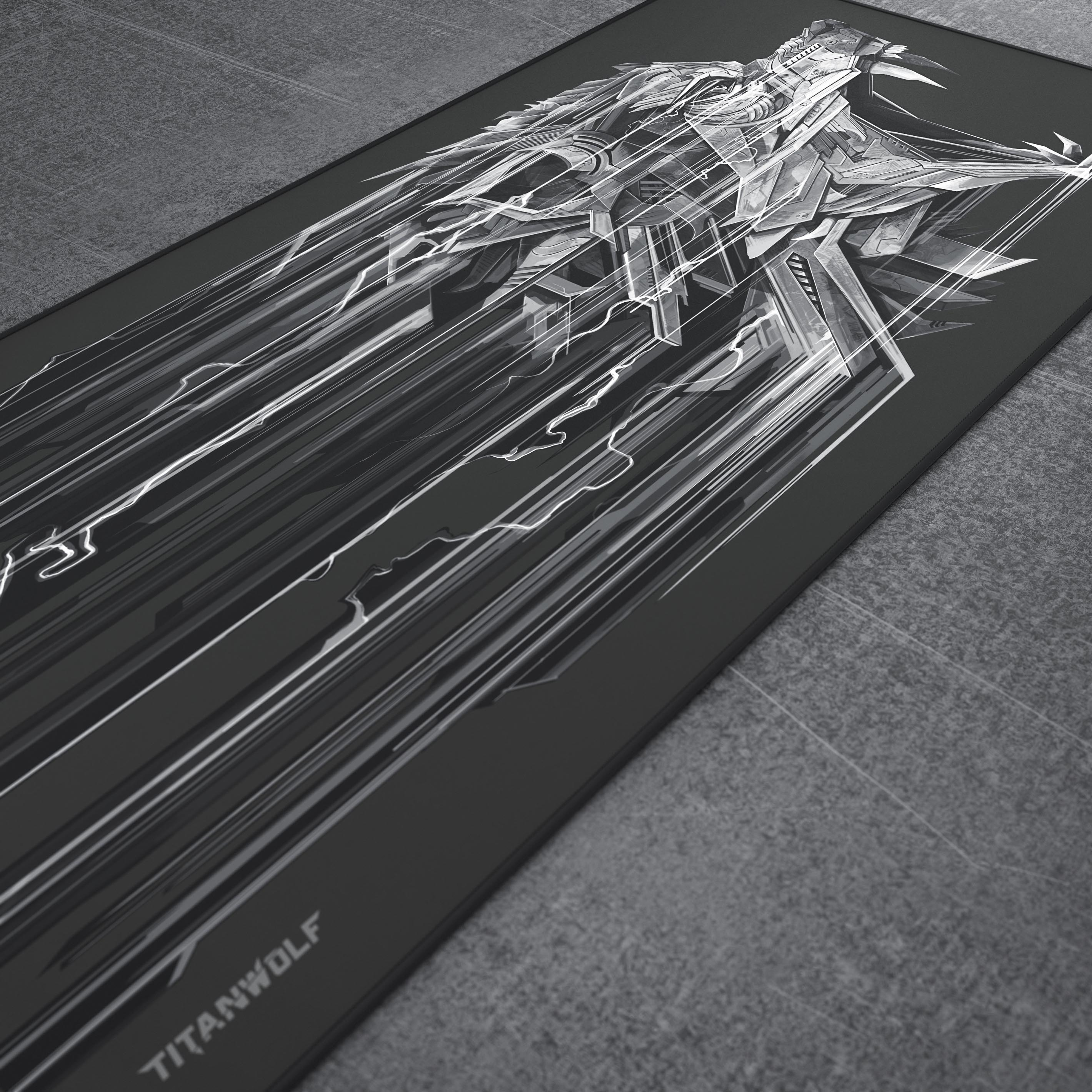 Schwarzes und graues Mousepad mit weißer Grafik und Titanwolf-Logo. Der Hintergrund ist grau.
