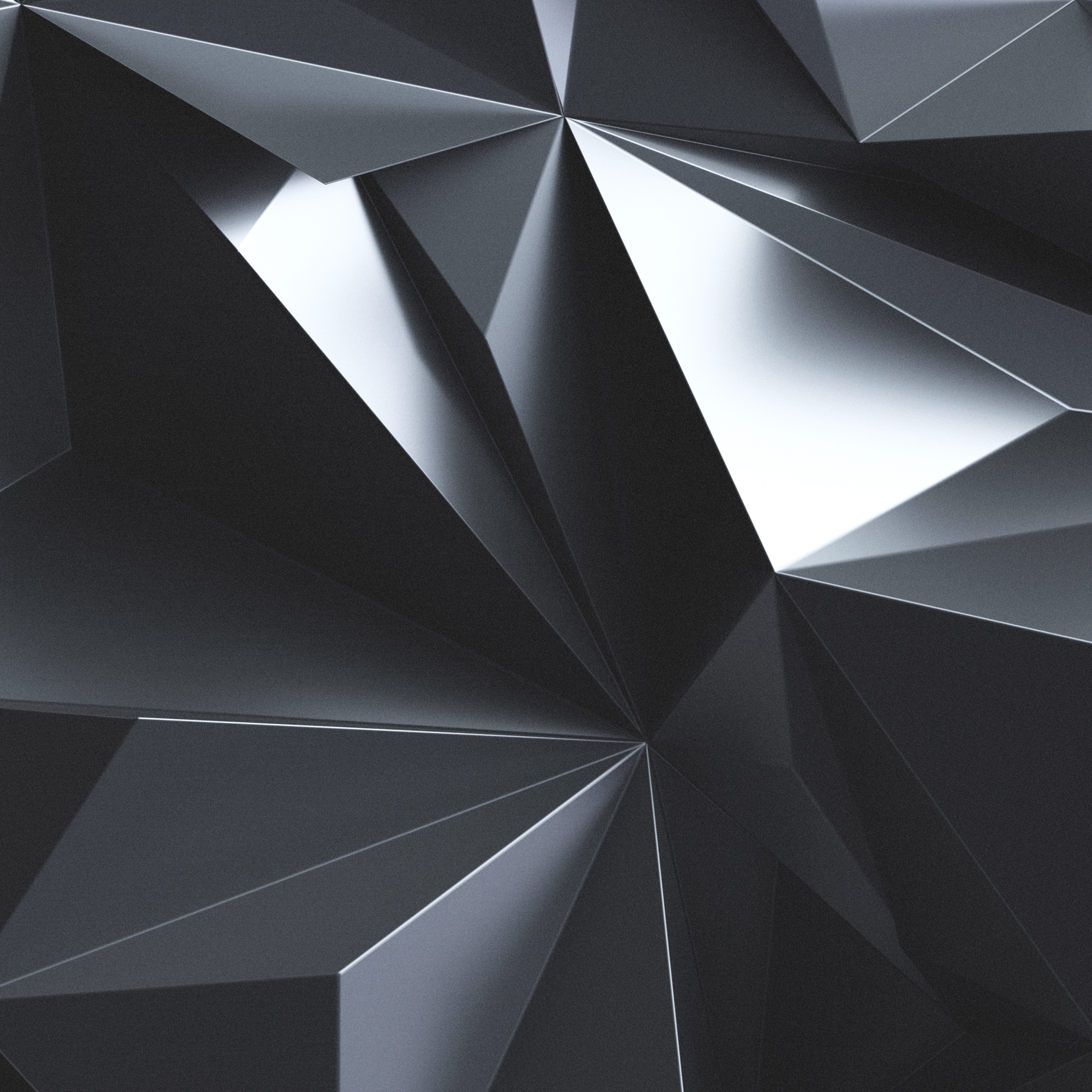 Abstraktes geometrisches Muster aus dunkelgrauen, dreieckigen Formen, die Licht reflektieren.