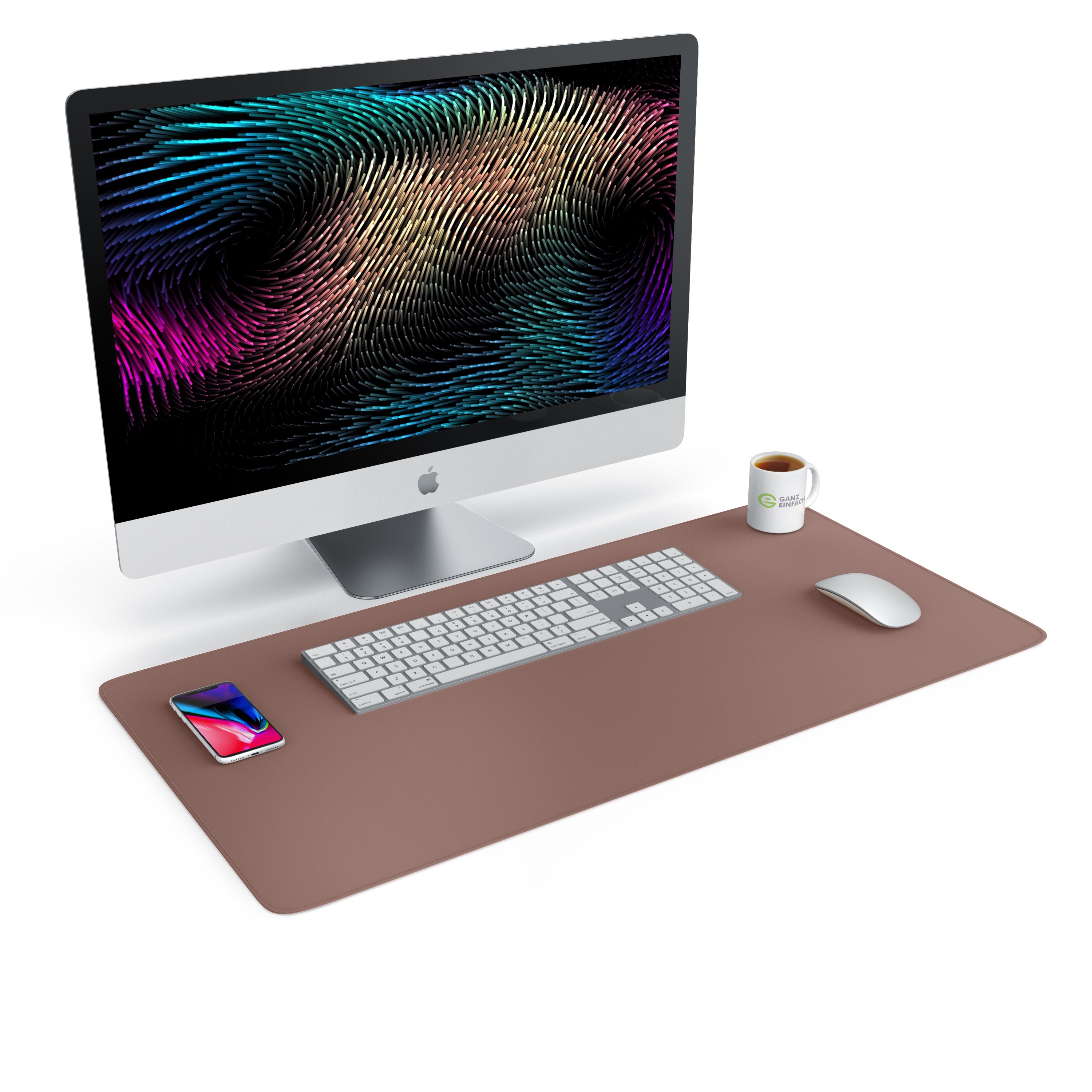 Arbeitsplatz mit Computer, Tastatur, Maus und Telefon auf einer braunen Schreibtischunterlage.