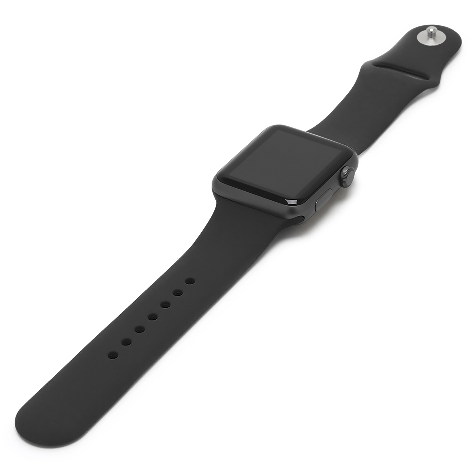 Apple Watch nera con cinturino nero. L'orologio è su una superficie bianca e angolato verso l'alto.
