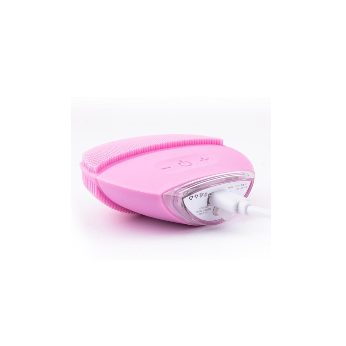 Un cepillo de limpieza facial rosa con puerto de carga y cable de carga conectado.