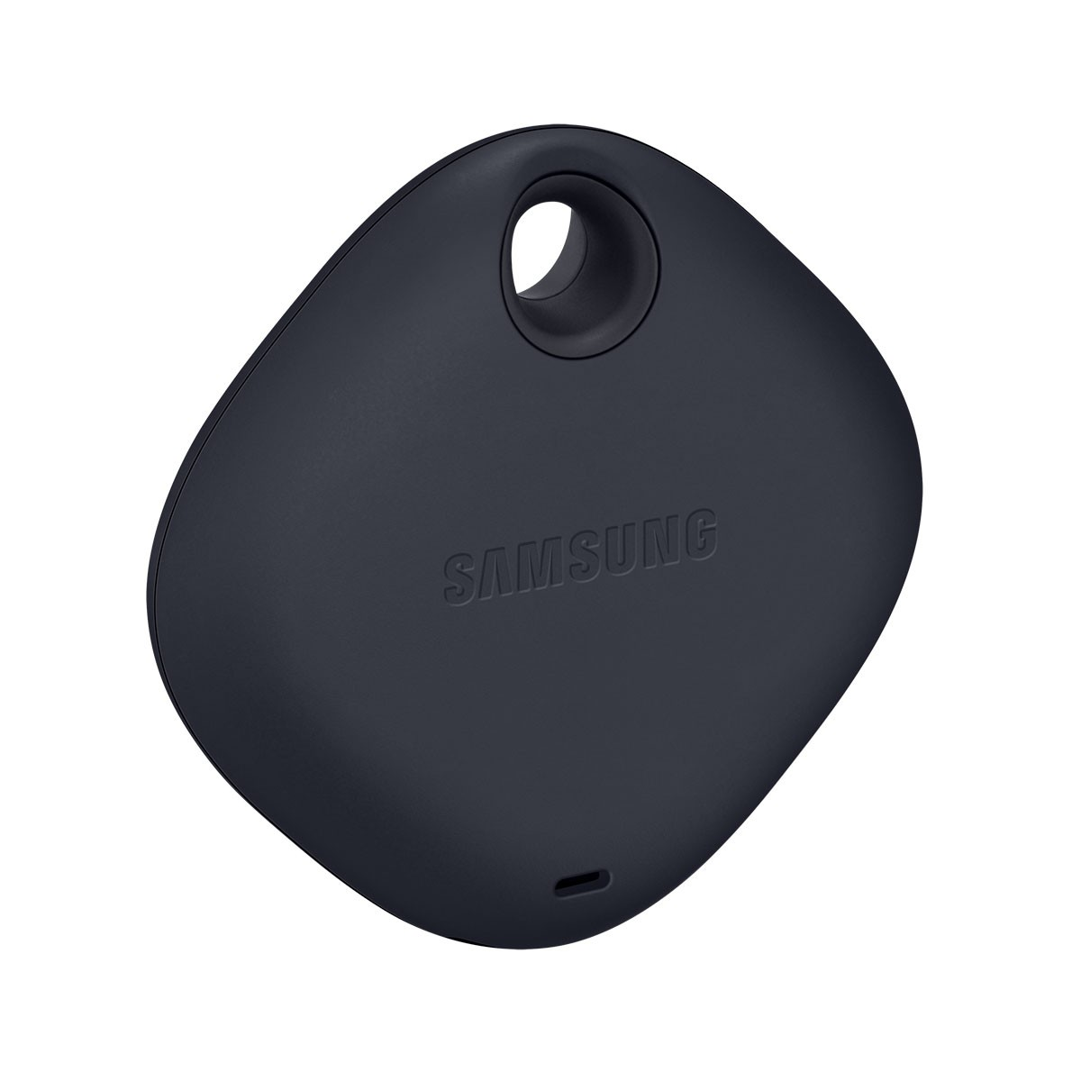 Mały, ciemnoniebieski tracker Samsung SmartThings z wytłoczonym logo.