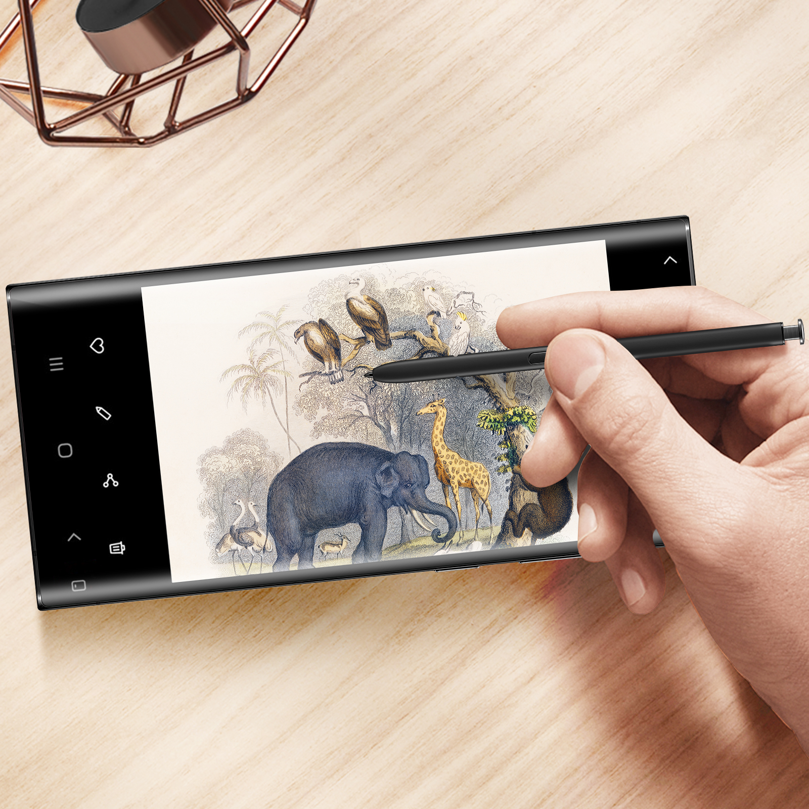Ein Smartphone mit Stift, das eine Illustration von Tieren zeigt.